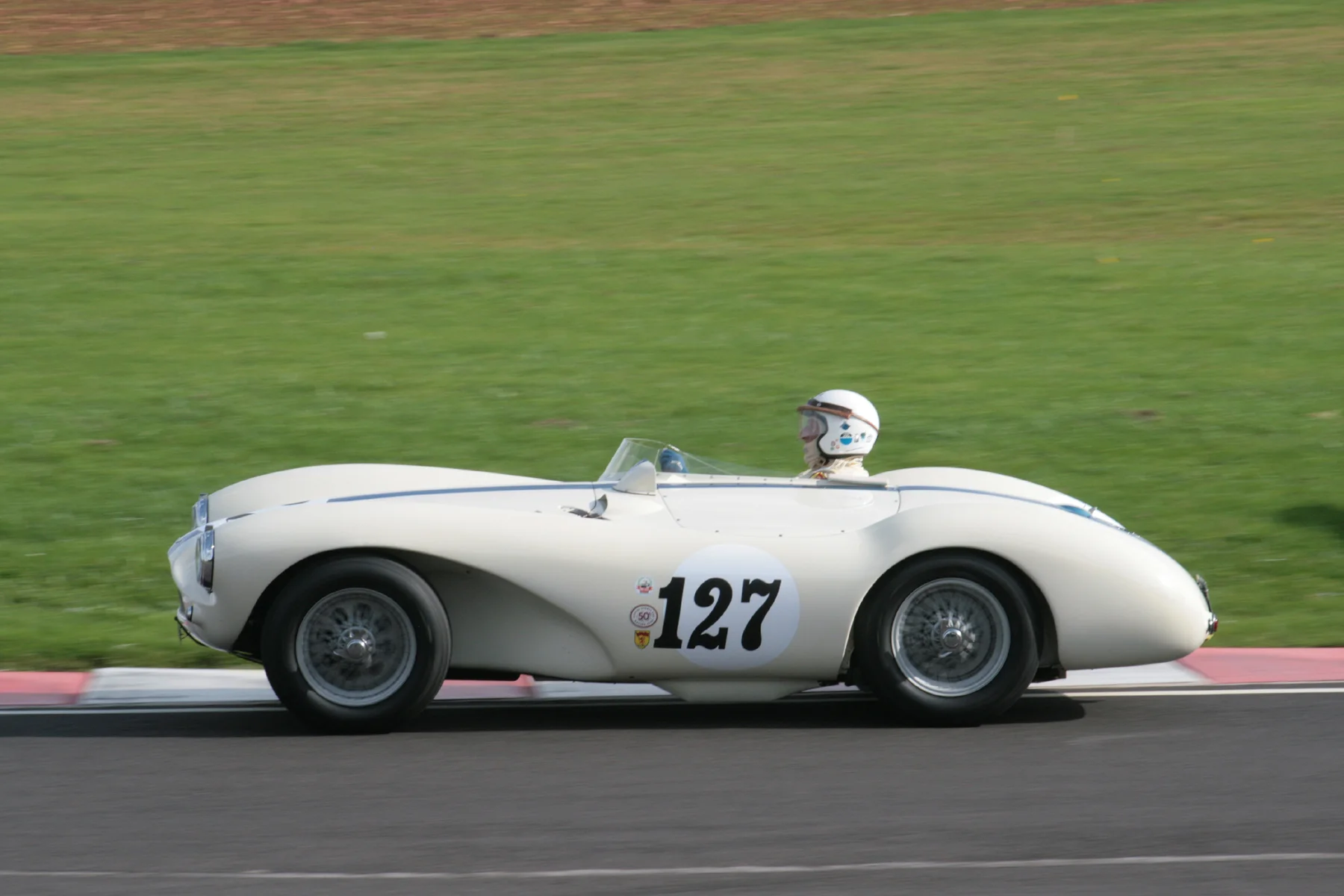 Surely, the second series body made the Aston Martin DB3S, one of the most beautiful sports racing cars ever built from any period. This is David Bennett's example (chassis 115), one of 3 such cars in the race. David finished 18th. Photo - John Turner 