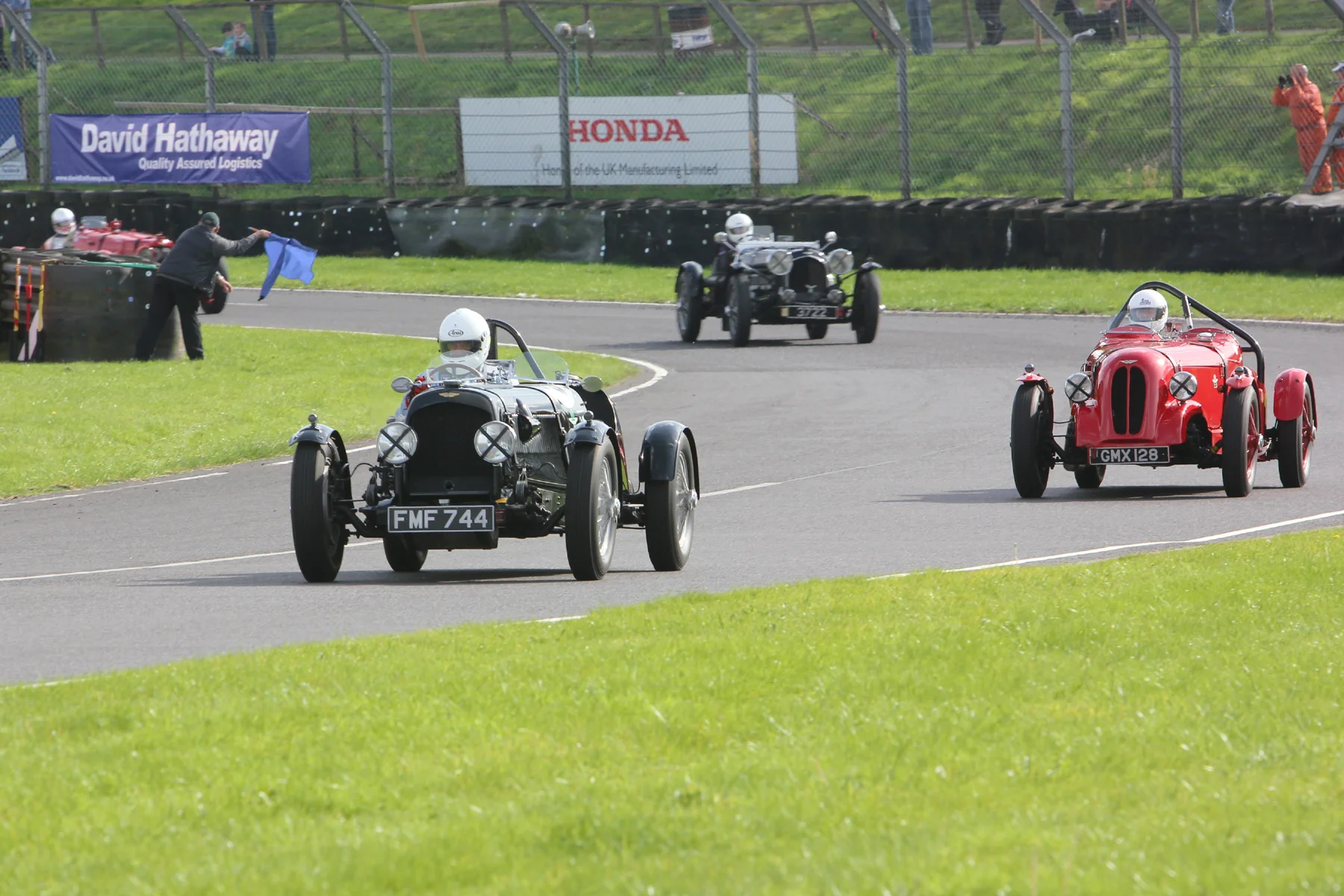 Paul Chase-Gardner (Speed 15/98), Peter Dubsky (15/98) and David Ozanne (Speed Replica) battle it out. Peter was to get ahead but 3 seconds covered all three of them at the flag! P hoto - Pat Arculus