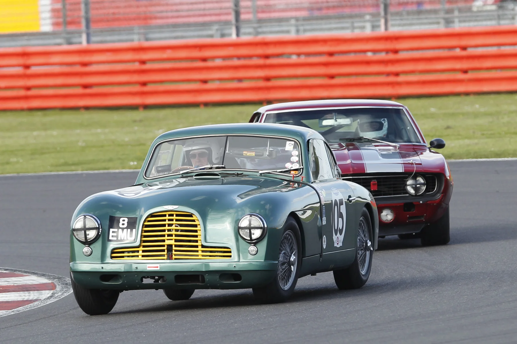 Andy Sharp briefly ahead of the Camaro in the early part of the race had to give best to the 'grunt' of the later car but less than a second split them at the flag and in fact the ASTON'S BEST LAP WAS VERY MARGINALLY QUICKER THAN THAN THAT OF THE cA,MARO. pHOTO - Mick walker 