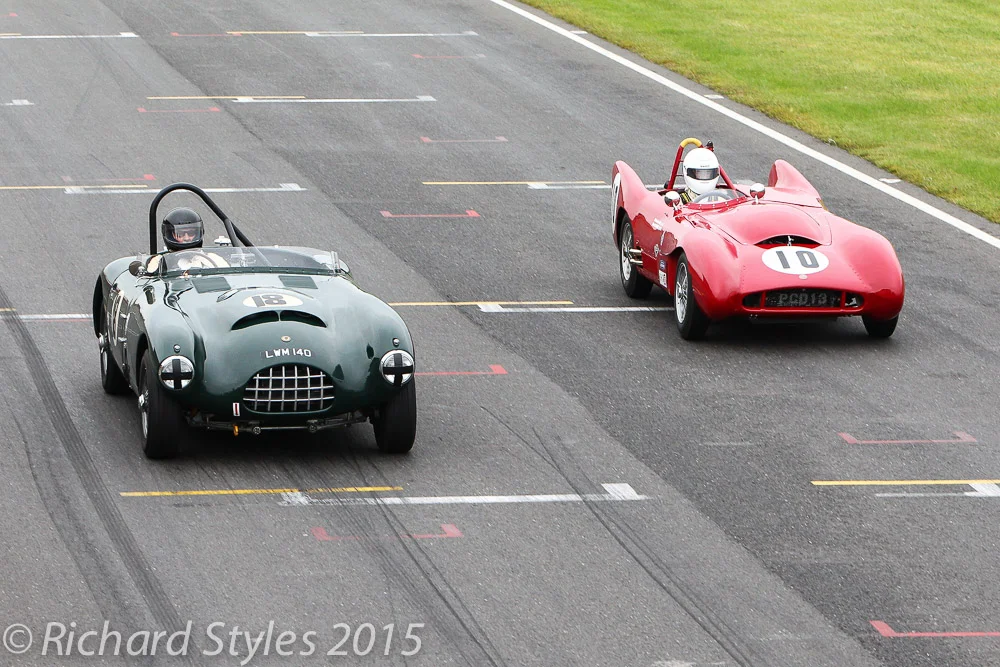 Overhead shot of Charles Fripp (Gomm Jaguar) being lapped by Malcolm Paul's Lotus Mk X 