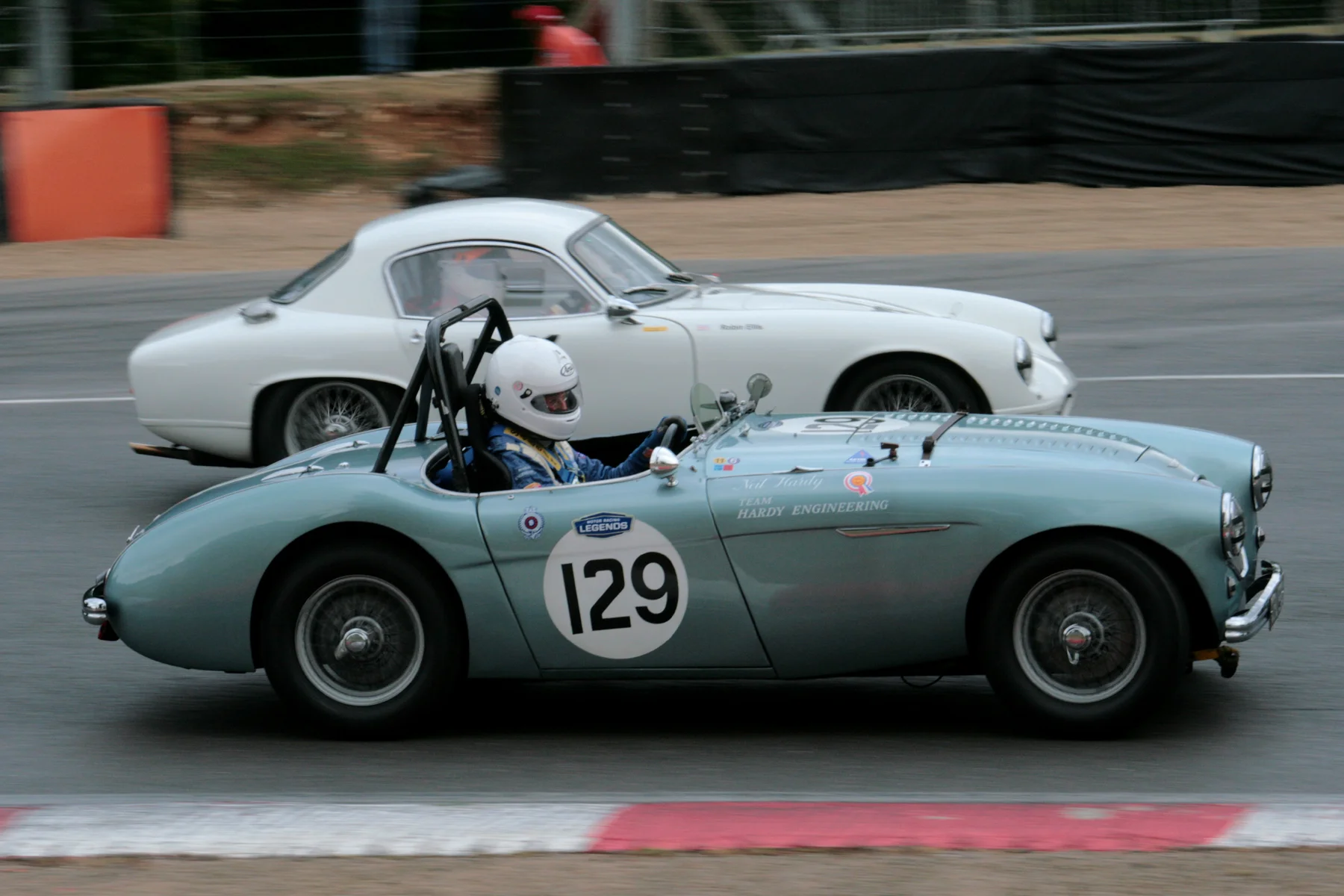 Neil Hardy (Austin Healey 100M) was the first FISCAR home when race results were declared after completion of just 2 laps following two red flag stoppages, the second of which led to abandonment of the race through lost time. A necessarily brief report now resides in 2015 Race reports menu. Photo - John Turner 