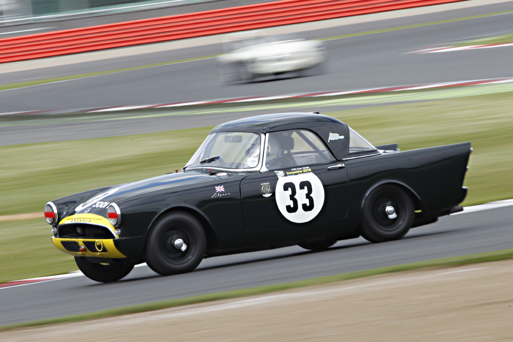 Keith Hampson at speed in the Sunbeam Alpine Le Mans Photo - Mick Walker