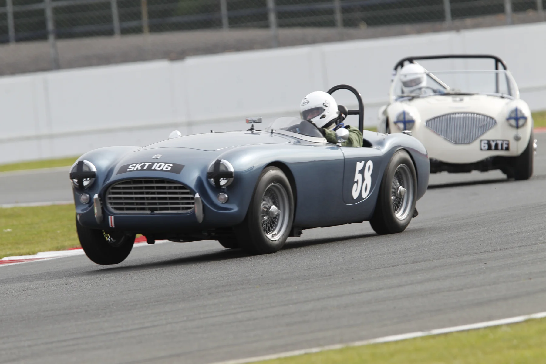 Mark Morgan lifts a wheel in practice Photo - Mick Walker 