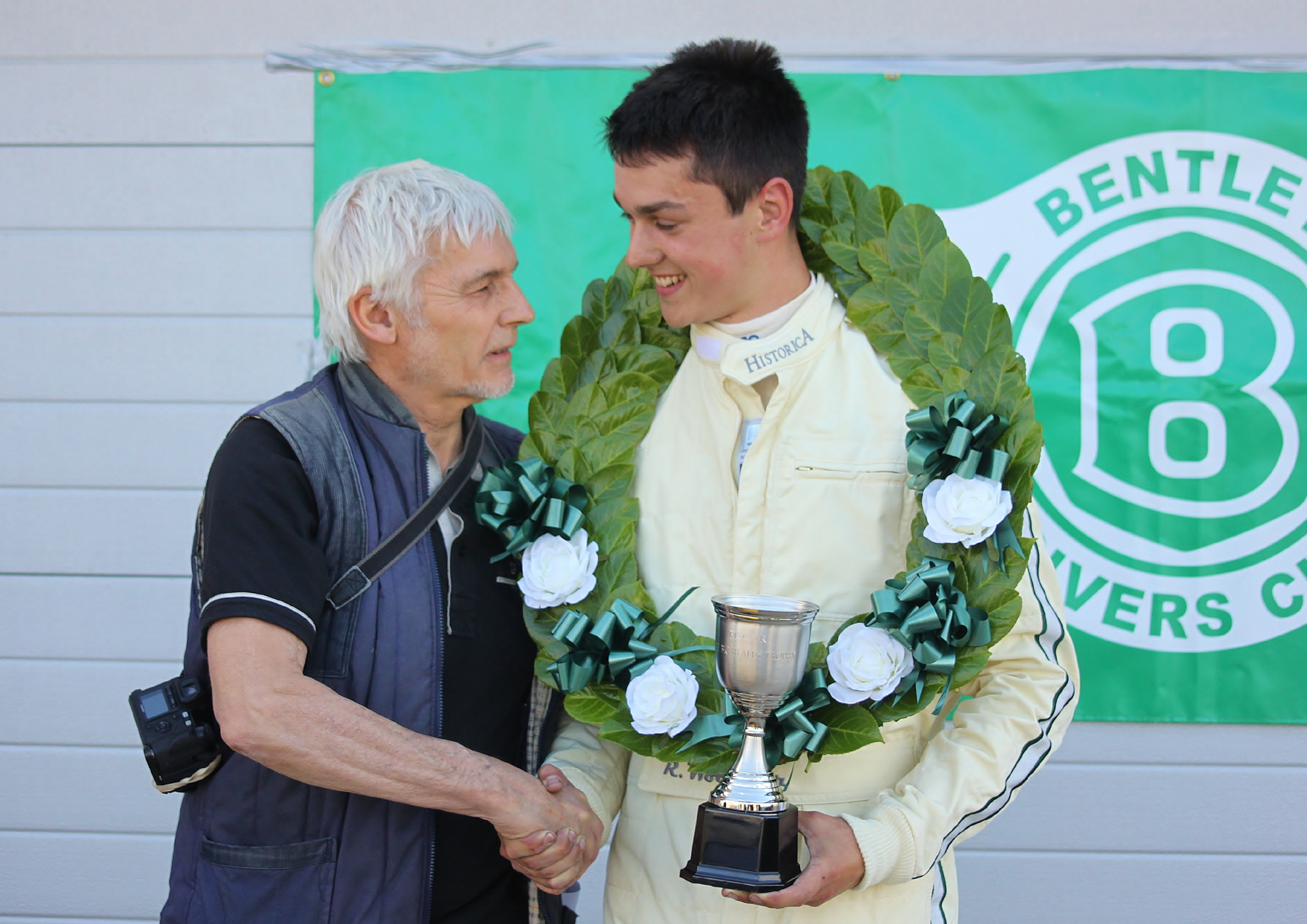 Richard Woolmer is delighted to accept the Bic Healey trophy Photo - Bob Bull, Tripos Media