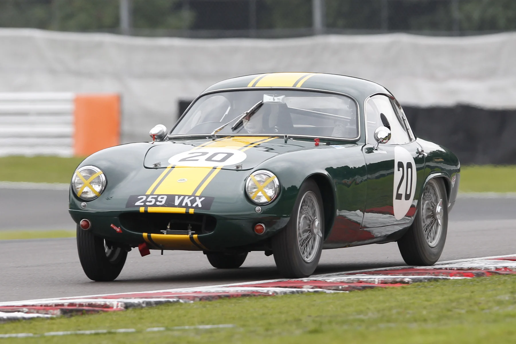 In a hard fought race with Jonathan Abecassis Austin Healey 100/4, Mike Freeman took victory in the first running of the Blaster Bates Trophy at the Oulton Park Gold Cup meeting, in his Lotus Elite Photo - Mick Walker