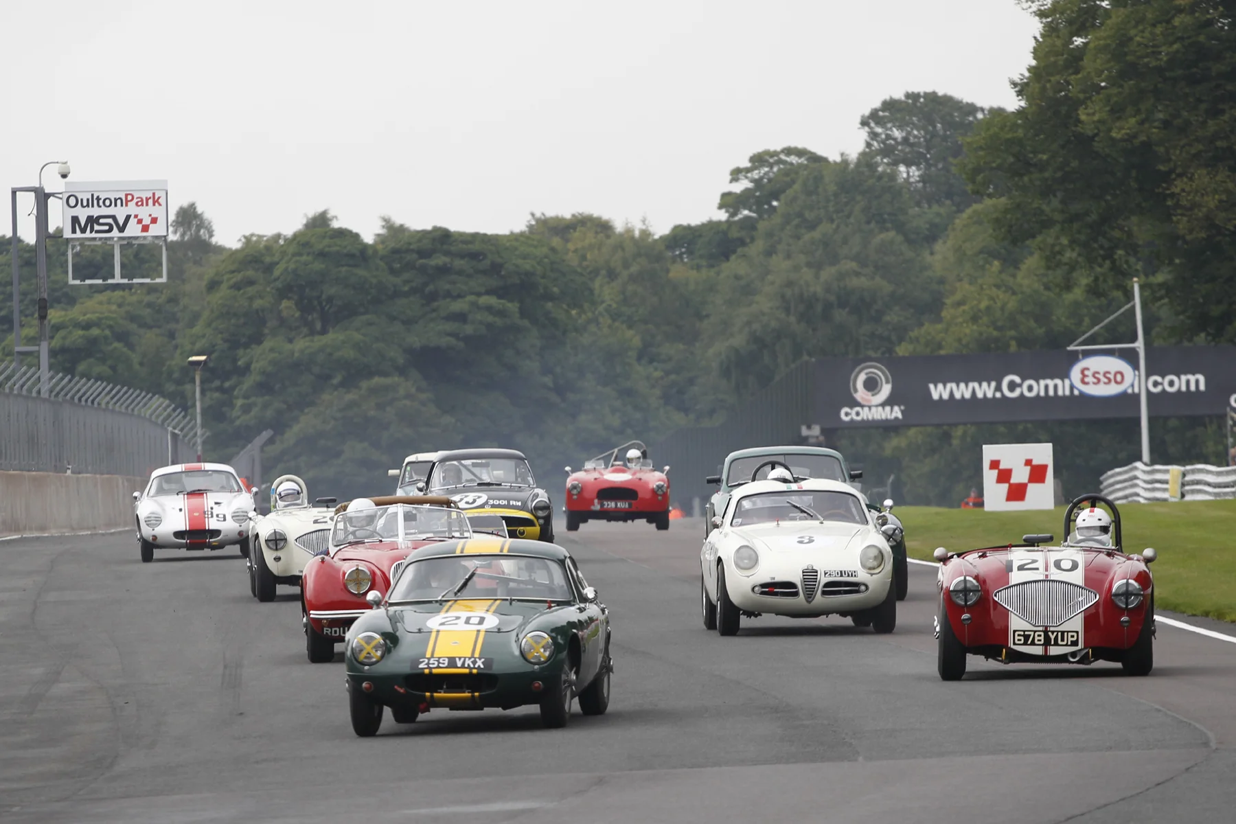Poleman Mike Freeman grabs the lead from Jonathan Abecassis whilst Geoff Ottley and Brian Arculus burst through from Row 3 to give chase. Photo - Mick Walker