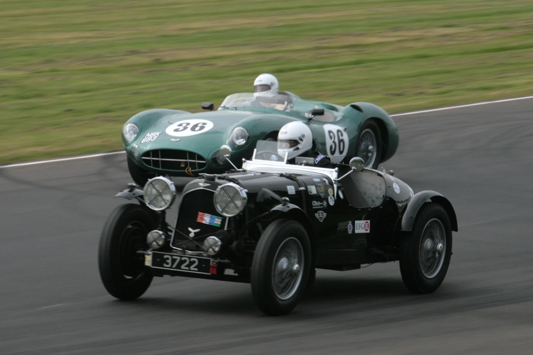 Qualifying and two cars destined not to take the race start. I have yet to establish why David Ozanne's Speed model Aston failed to start and Adrian Beecroft's DBR1/300 which fell victim to a very unfortunate accident in the earlier FISCAR race Photo - John Turner