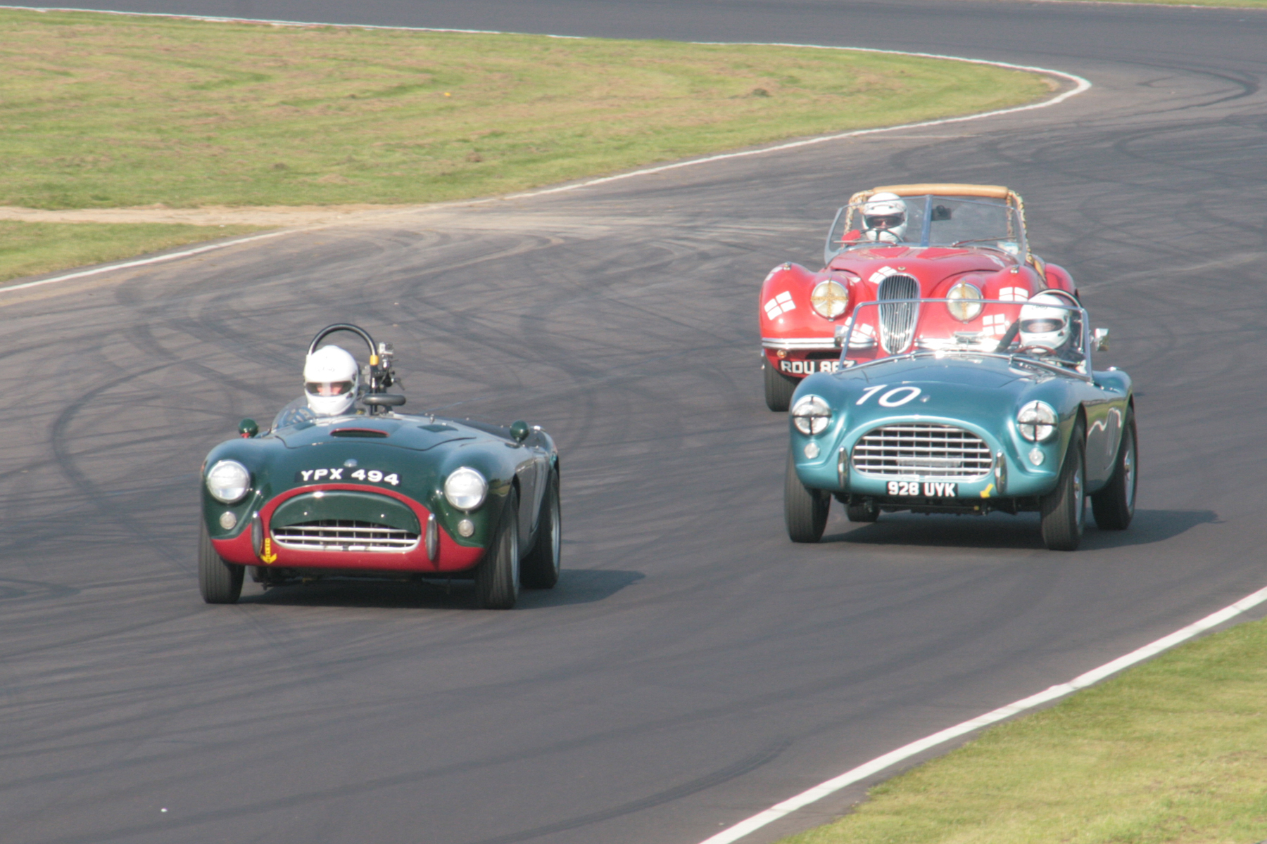 Aces High. The Pearce and Cottingham Aces together, with the Geoff Ottley/Kevin Zwolinski XK120 behind. Photo - JohnTurner