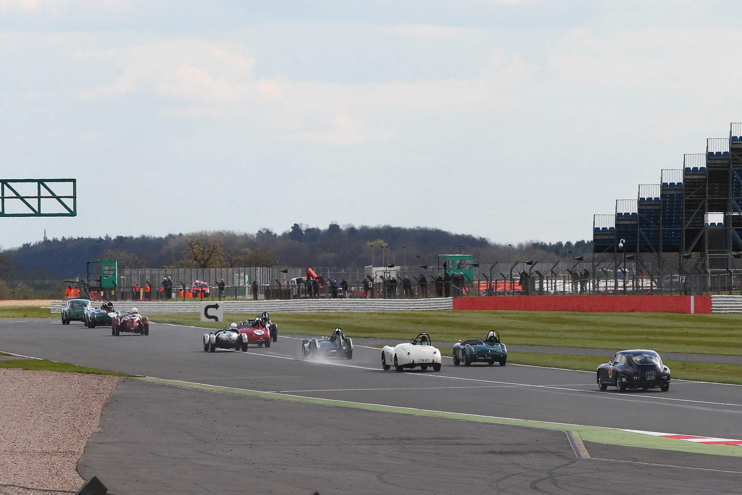 The leading cars stream away from Copse with Sharp being hounded by Boultbee Brooks and McWhirter. Photo - Richard Styles