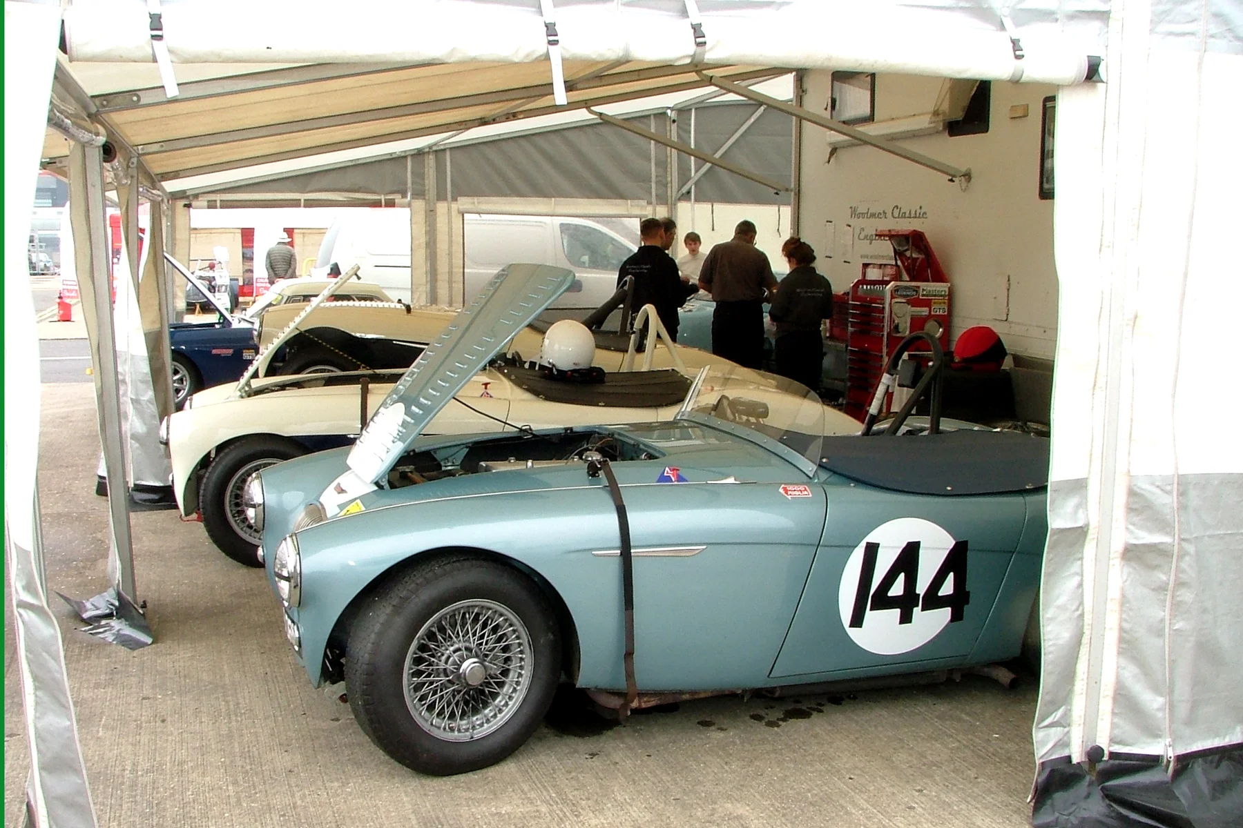 The Woolmer Classic Restoration enclosure bulging with Austin Healeys. It also provides FISCAR's hospitality which is the other side of the unit In the foreground, Robert Clarke's 100/4. Photo - John Turner 