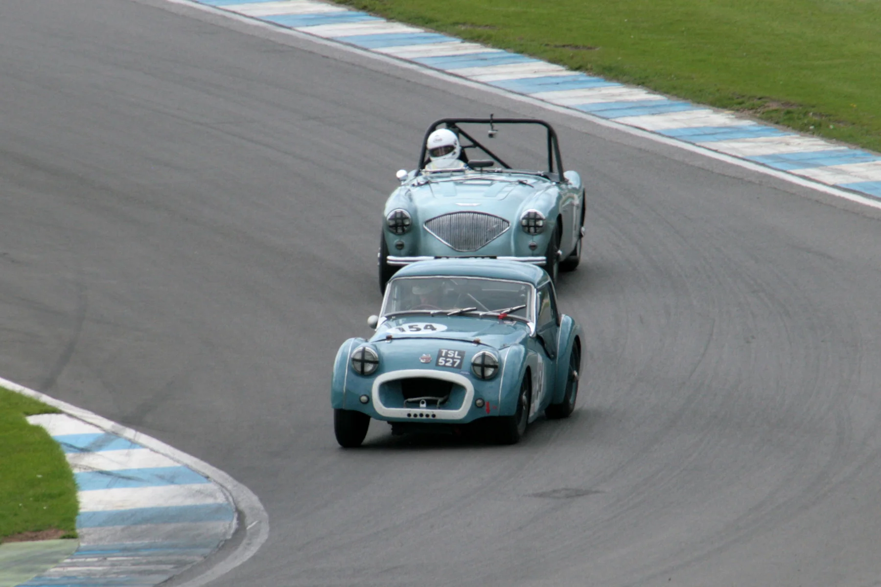 Neil Hardy about to lap Paul Ziller, in his pursuit of Nick Matthews Photo- John Turner 