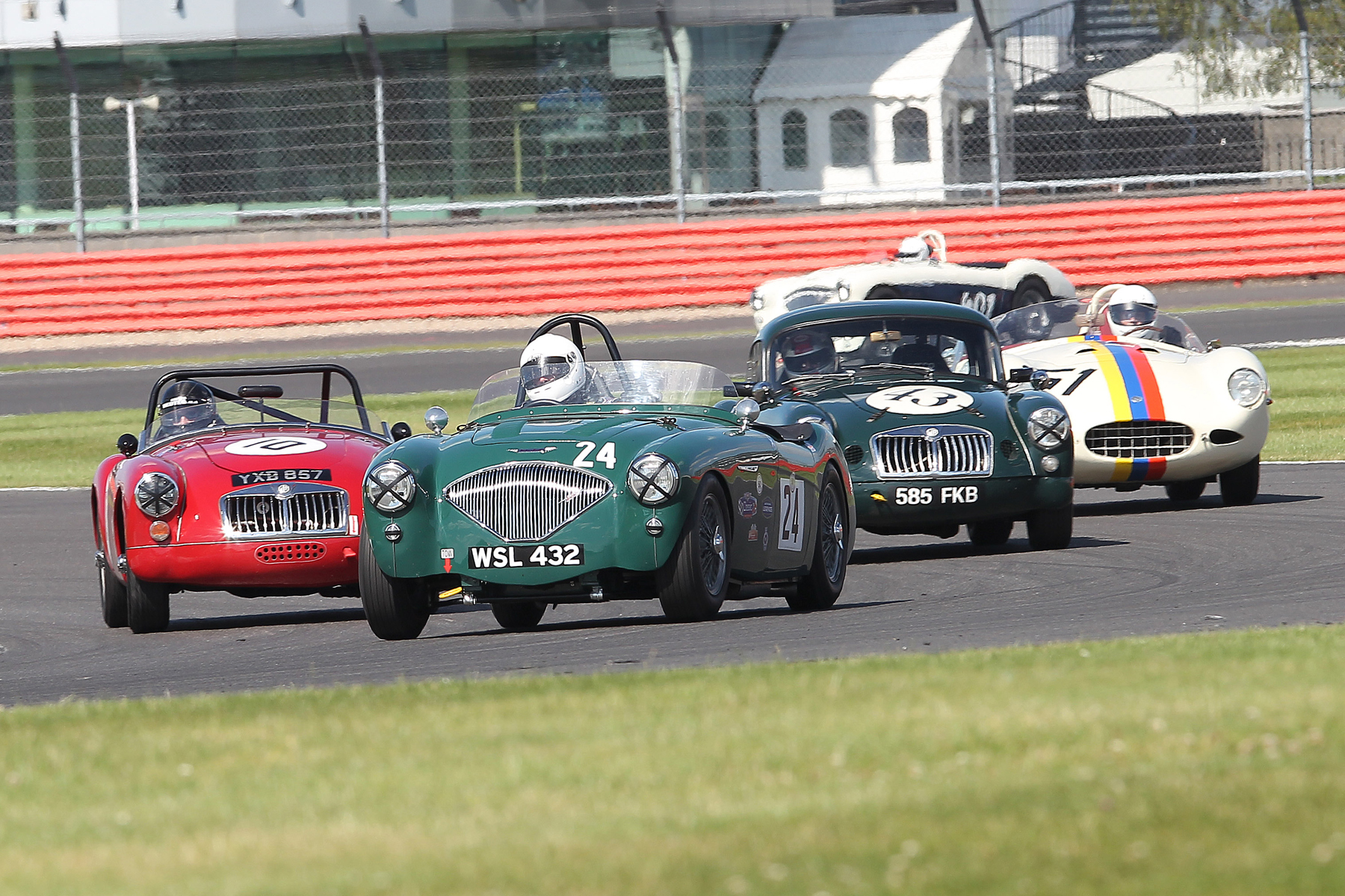 Jim Campbell leads Glen Tollett and Nigel Winchester as they lap Terry Bryant's MGA (10) Photo - Mick Walker