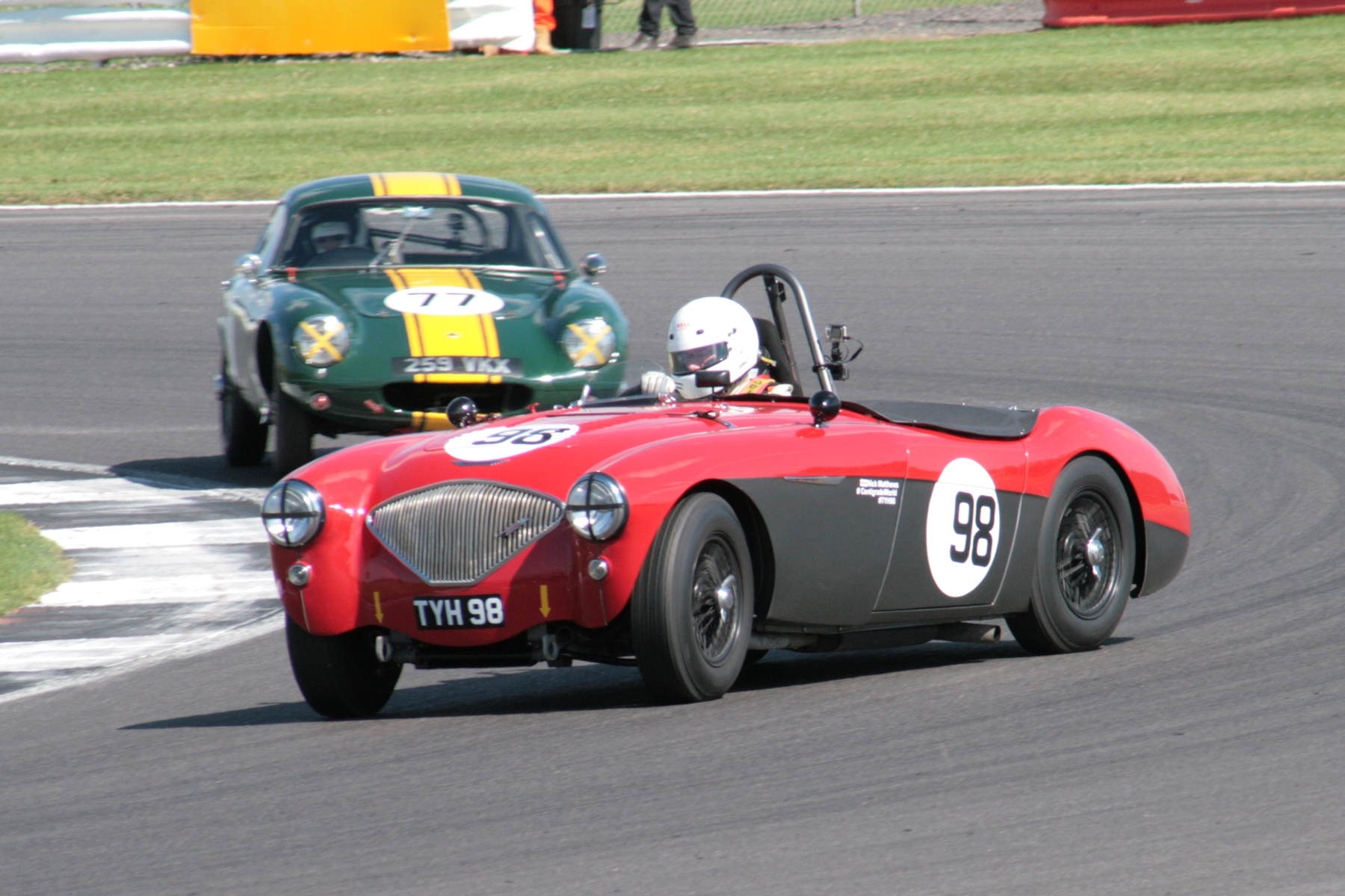 Nick Matthews opposite locking in Luffield in his battle with Mike Freeman before their pit stops Photo - John Turner 