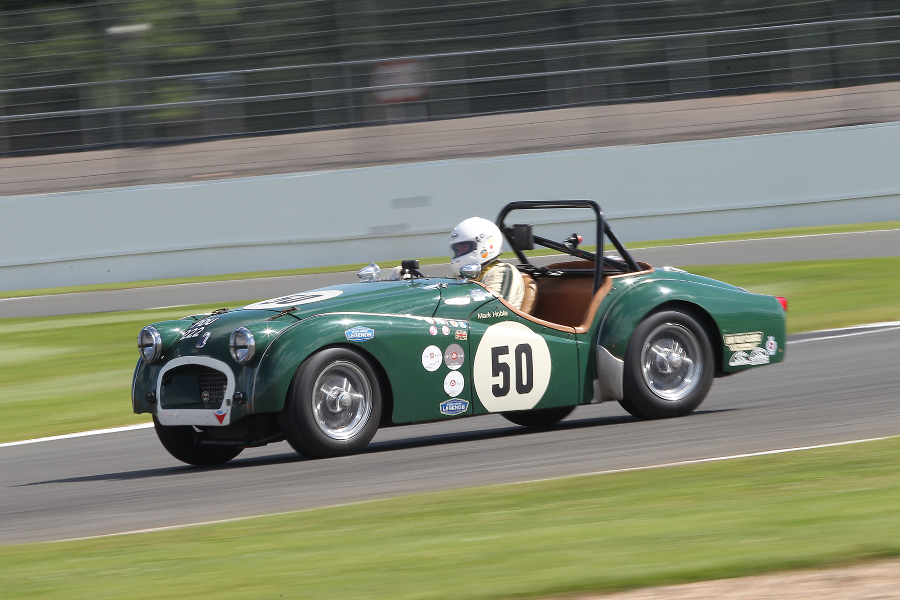 Mark Hoble with a touch of opposite lock in his Triumph TR2 Photo - Mick Walker