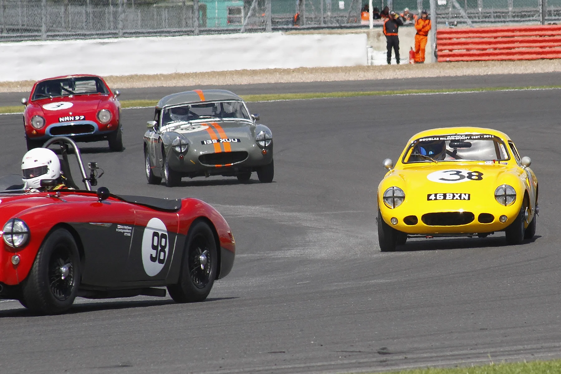 As the classically handsome lines of Nick Matthews 100/4 exits stage left, there follows, line astern, some superb examples of a slightly later period of the art of closed sports car design. Photo - Bob Bull, Tripos Media