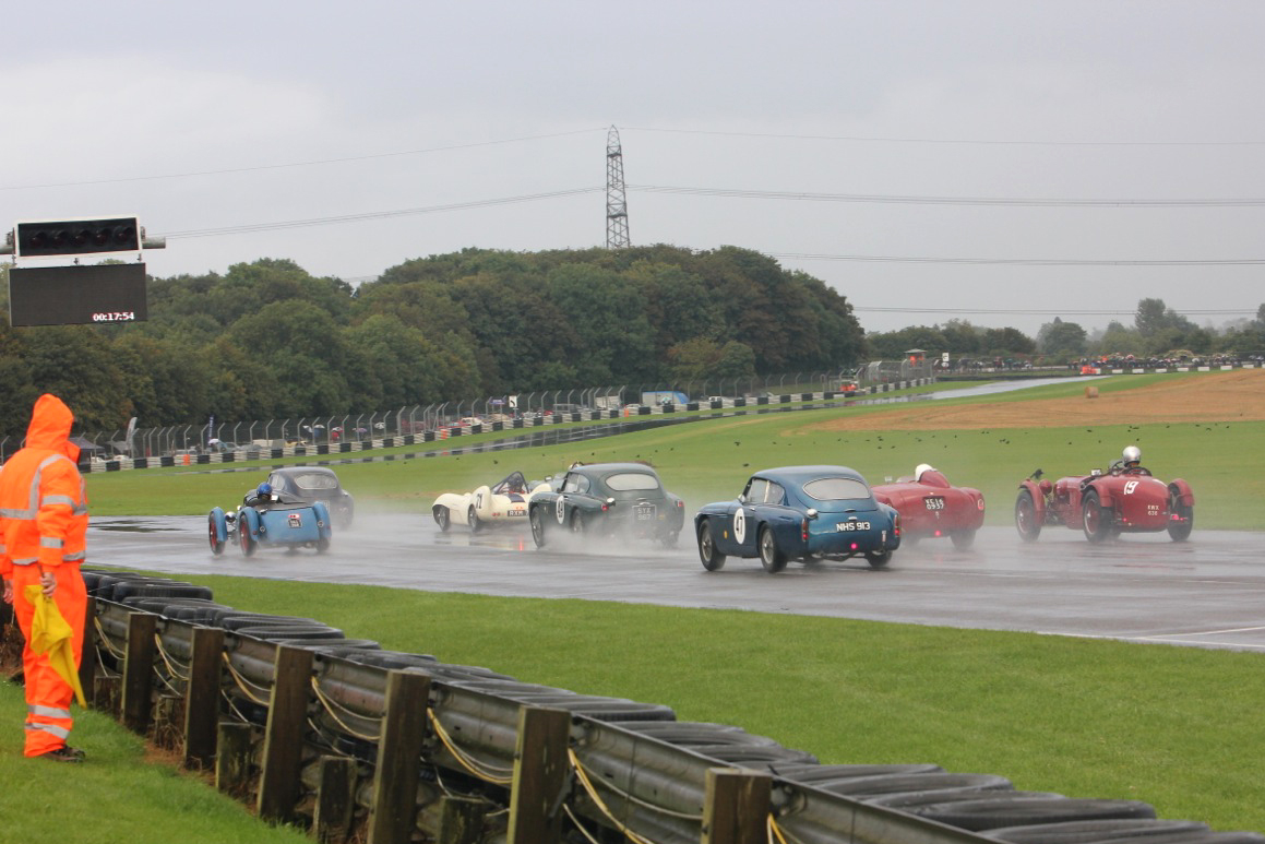 The first 4 rows +1 get away. Mark Gillies seems to have made a poor start in the Monoposto (19) whilst Simon Jeffries has made a good start from row 5 in his blue DB MkIII (47) Photo - Pat Arculus, Tripos Media