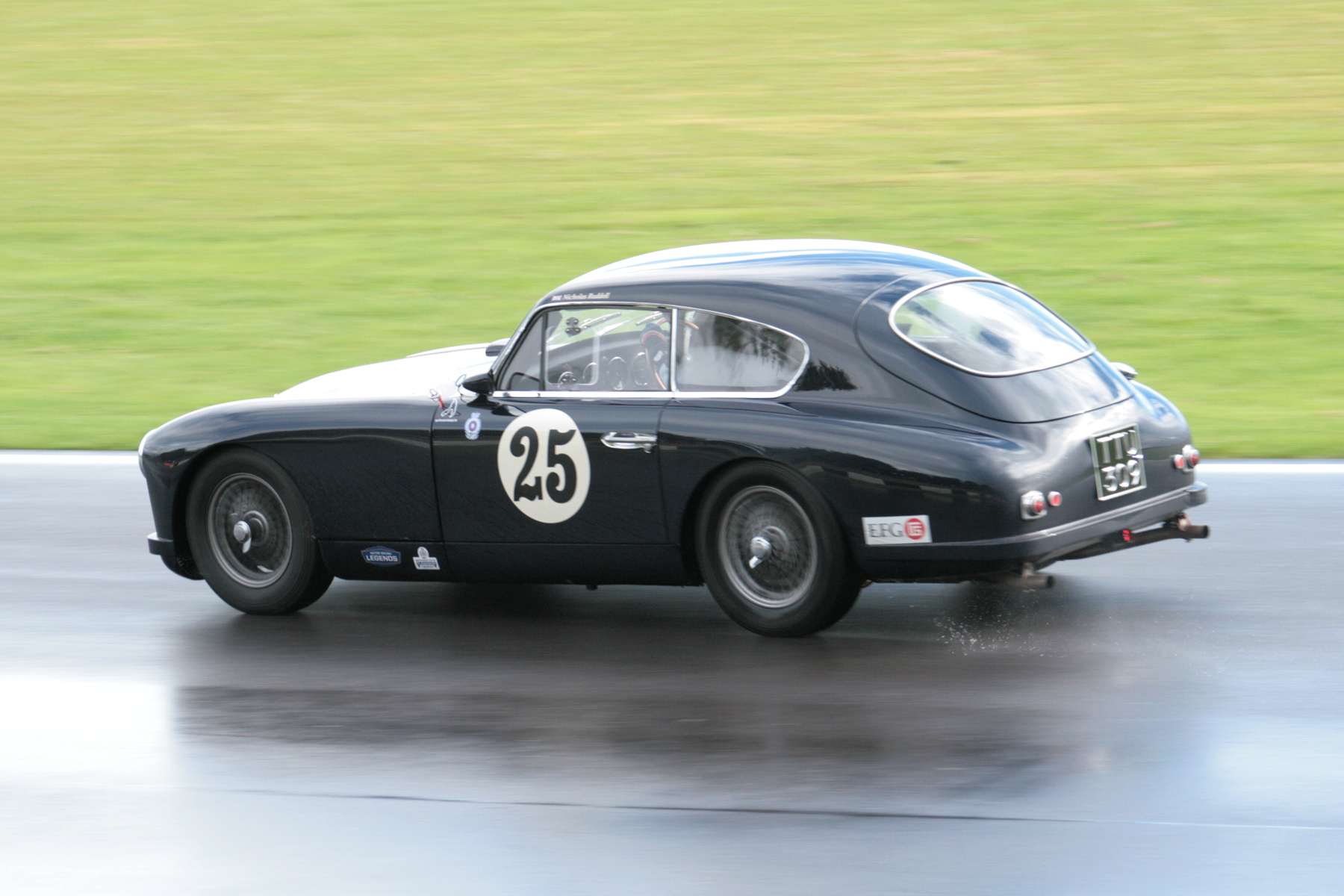Nick Ruddell on his way to 13th overall in his Aston Martin DB2/4. He was to race again later in the day, in the Jon Gross memorial Trophy. Photo - John Turner