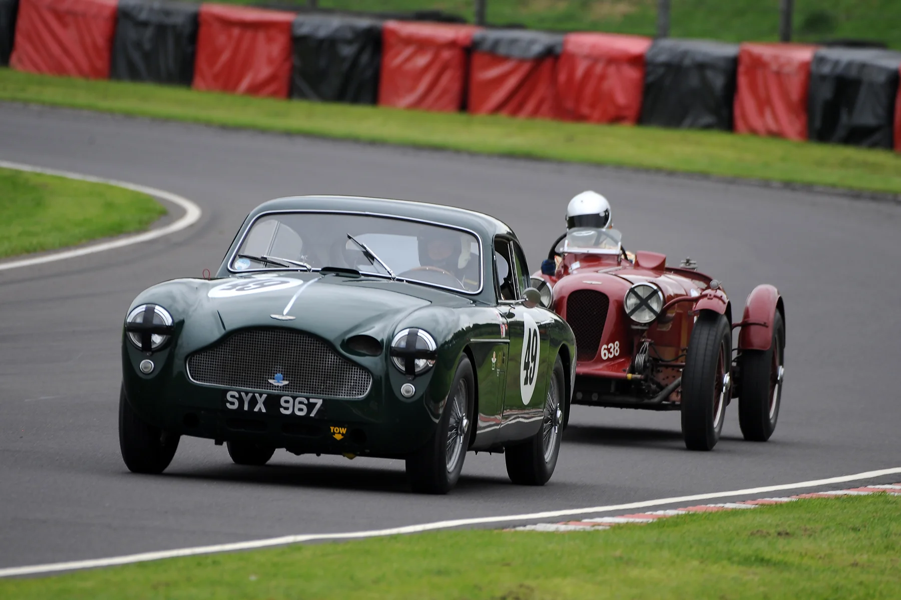 In the Jon Gross Memorial Trophy, the GT class winner was, very appropriately, Chris Woodgate, driving Jon's Ex Sebring Aston Martin DB MkIII which is still retained by the Gross family. Here Chris is seen ahead of the Aston Martin Brooklands driven by Mark Gillies who again won the Mort Goodall Cup for prewar Astons. Photo - Jeff Bloxham
