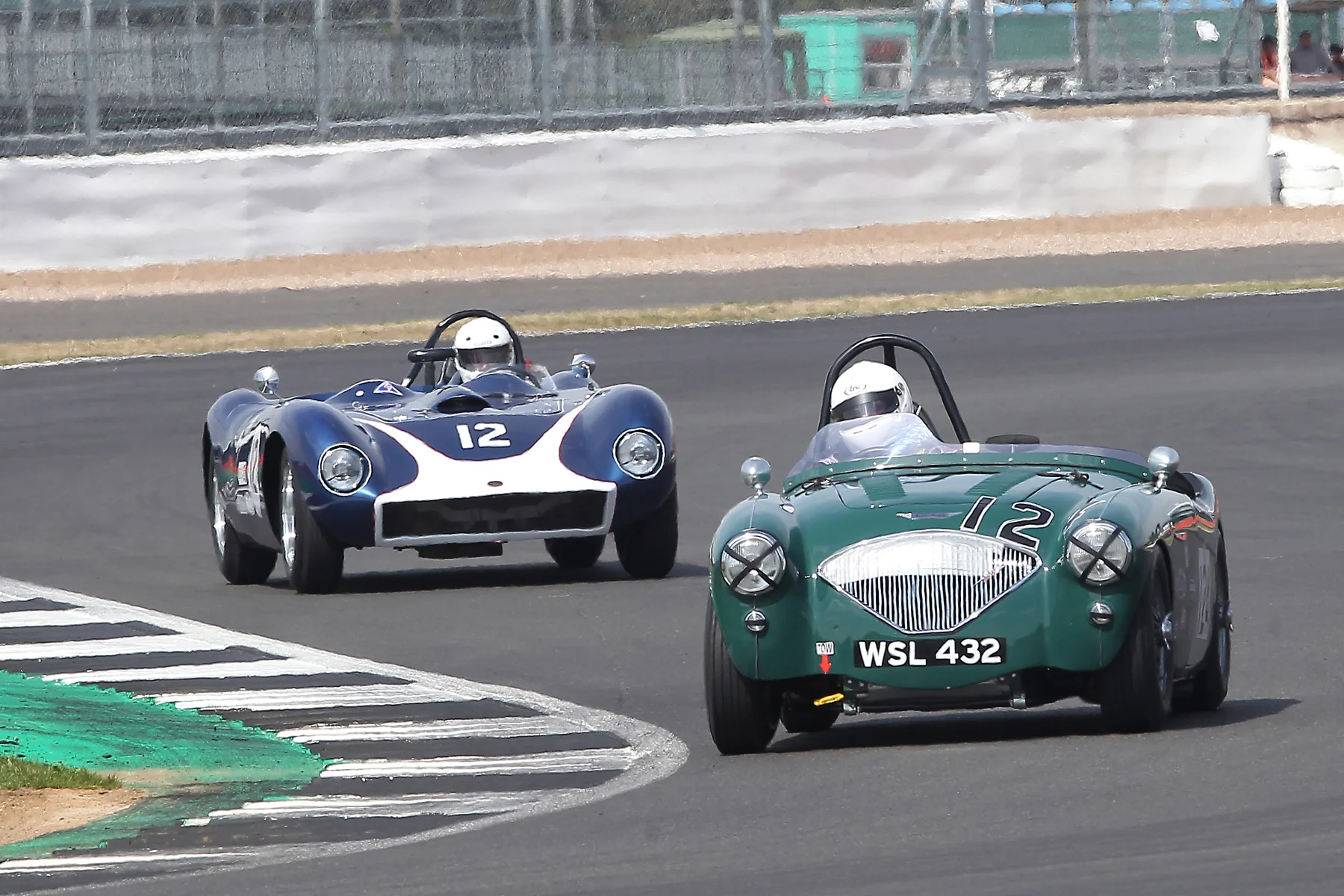 Jim Campbell fights off the close attention of Richard Tyzack's rare V8 Kellison J4R. Photo - Mick Walker