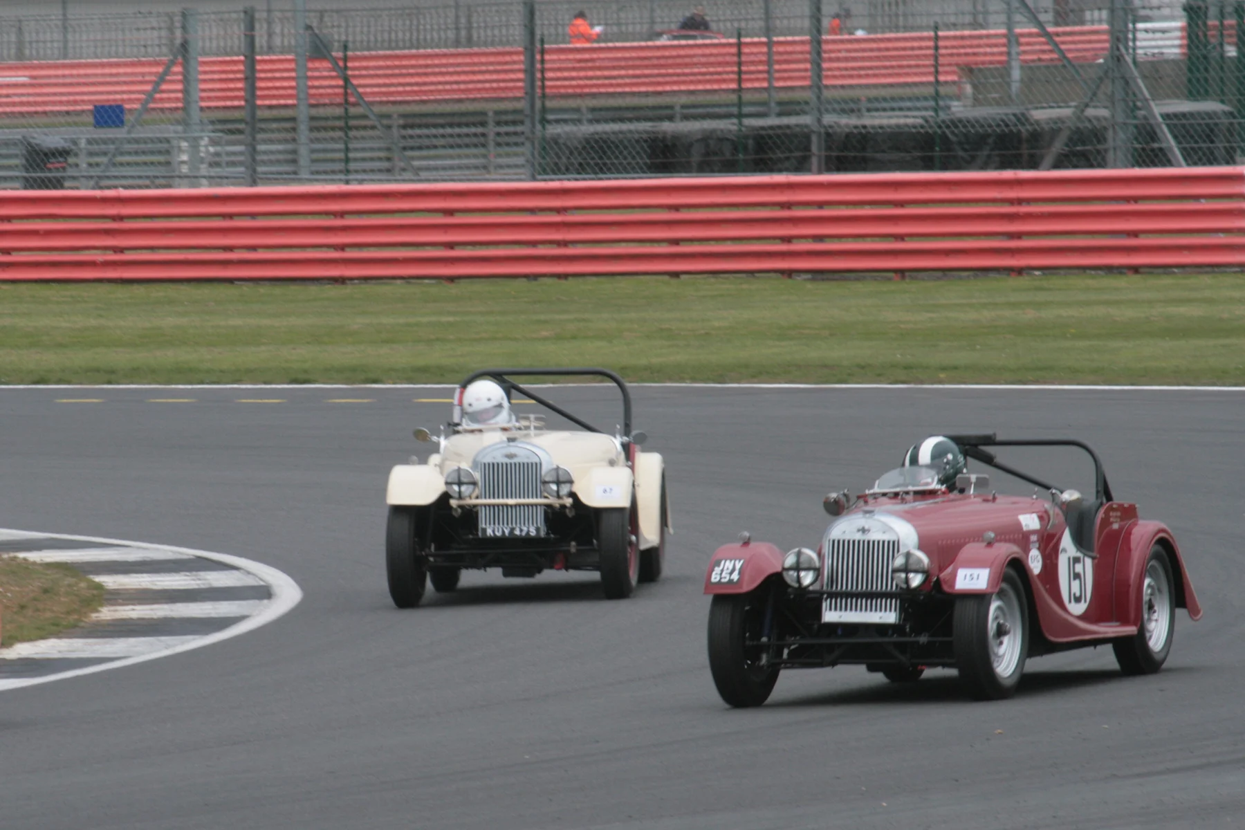 The splendid and rare sight of two Flat Rad Morgan Plus 4s - Leigh Sebba and Mark Shears battle it out. They were even closer at the flag Photo - John Turner