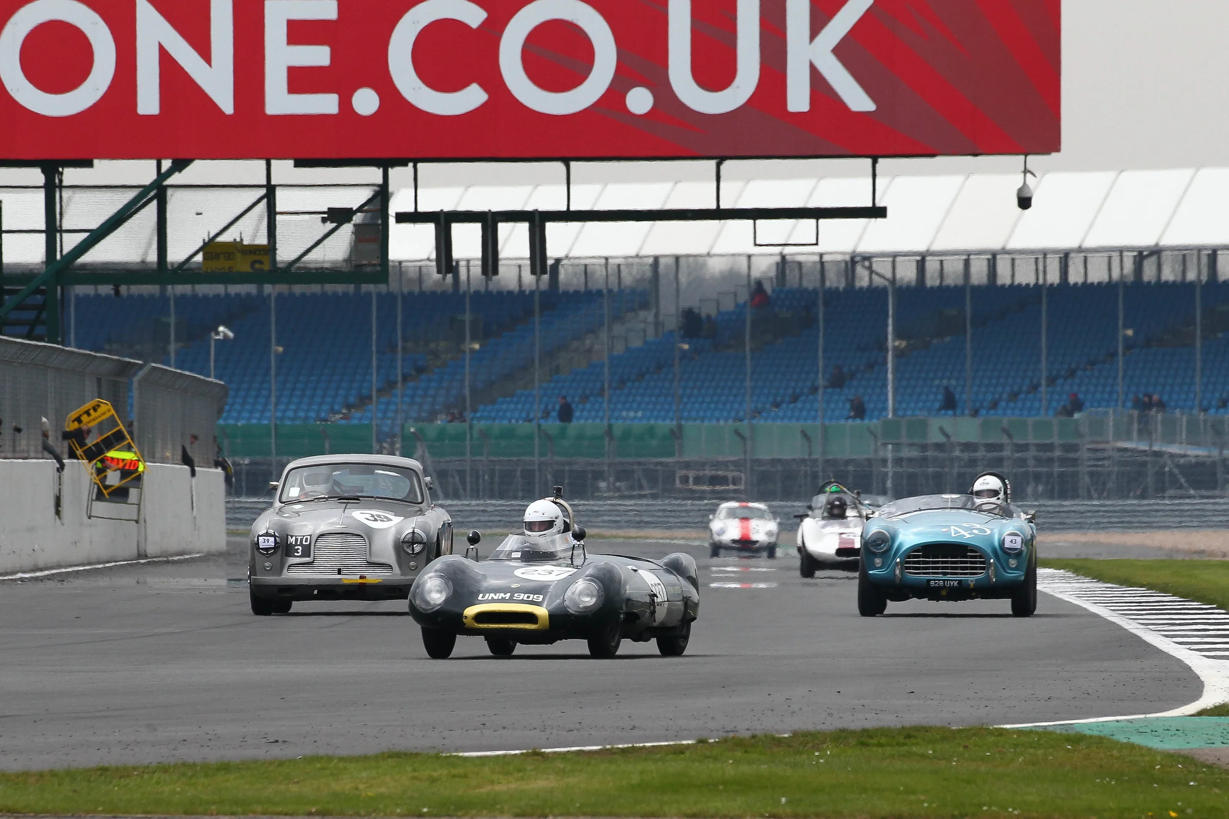 The Aston Martin DB2/4 of Tim Stamper and David Cottingham’s AC Ace bear down on Simon Kelleway’s Lotus 11. Behind is Ralf Emmerling’s Elva Mk5 and Martin Stretton in the Frazer Nash Targa Florio owned by David Graus. Photo - Richard Styles
