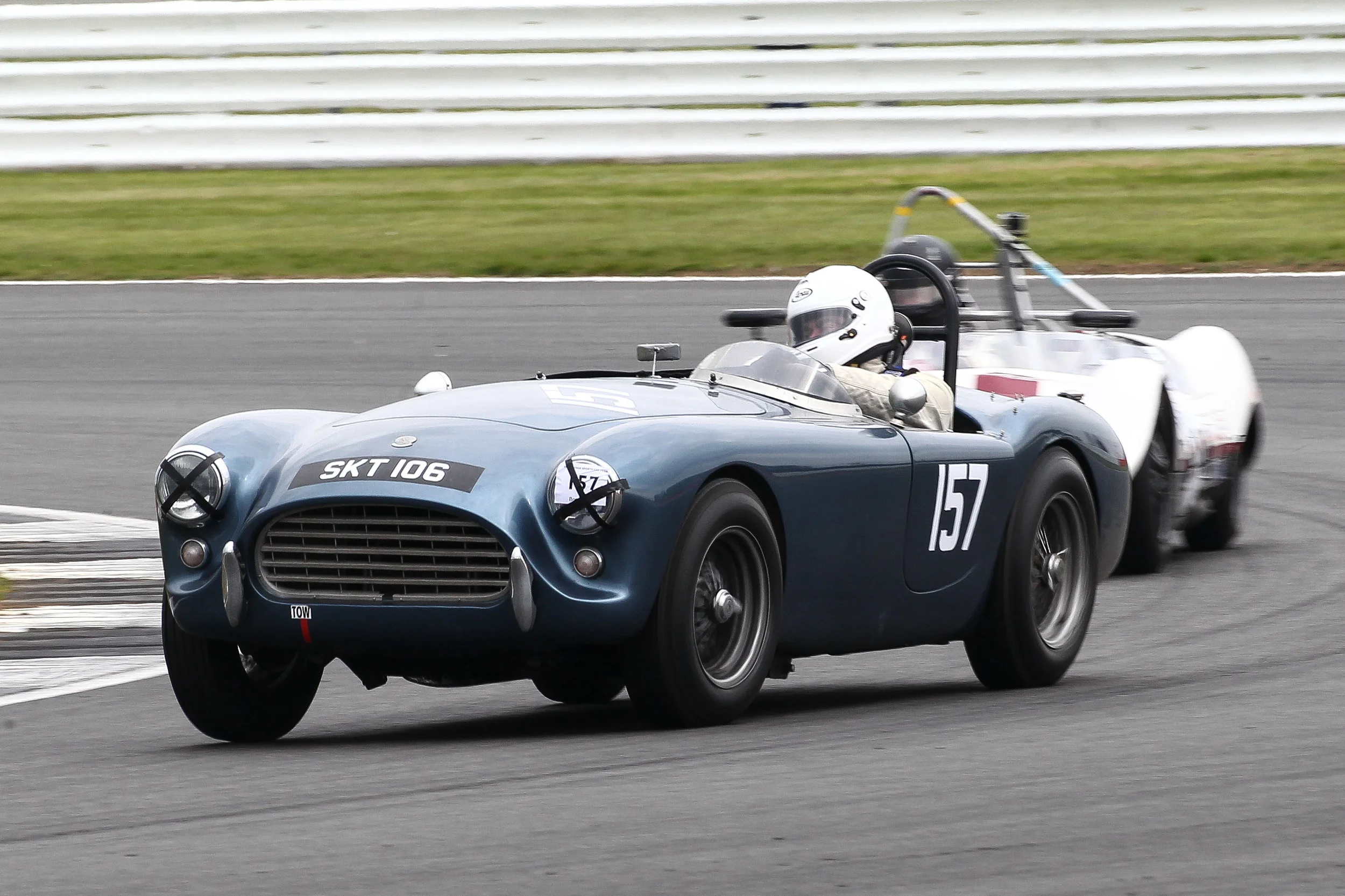 Mark Morgan working the wheel in his AC Ace . Photo - Richard Styles