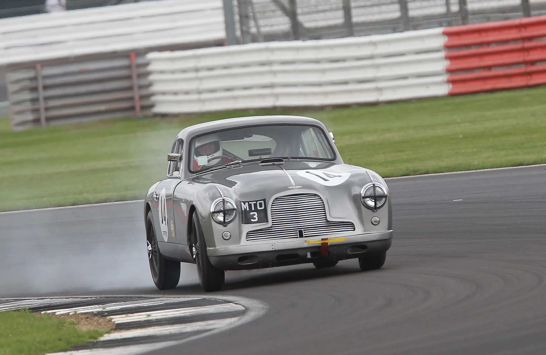 Tim Stamper’s splendid drive came to an end when he retired the Aston with an oil leak, at the end of lap 11 Photo - Mick Walker