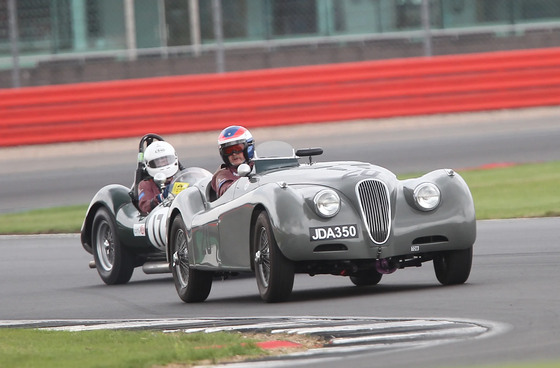 Another was that between John Harper in the XK120 and Alex Quattlebaum in the LECo, until the pitstops intervened. They even have matching race suits! Photo - Mick Walker