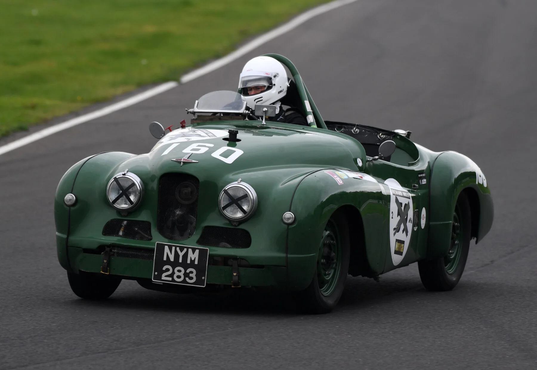 Harry Naegar in the Jowett Jupiter. The Jowett was not on the pace of the rest, but it was the oldest car in the field and such a car as this won its class at Le Mans in 1950, no mean feat. Photo - Jeff Bloxham