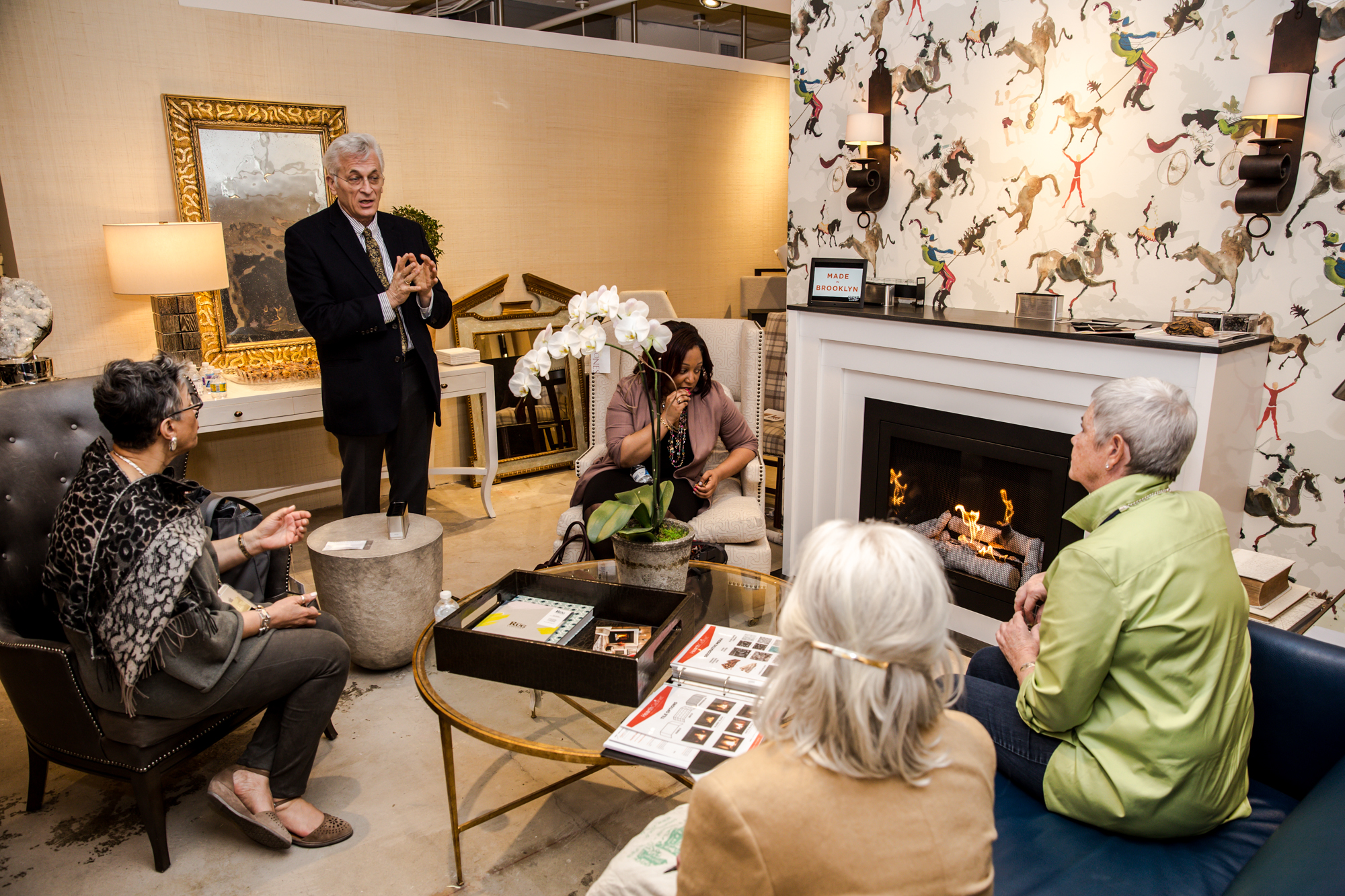 Arthur Lasky, RA, President & Chief Designer of HearthCabinet™ Ventless Fireplaces, demonstrating the product at Hines & Co showroom in the Washington Design Center Spring Market Day event (© 2017 Kaz Sasahara, www.lancerphotography.com | Instagram: kaz_tography)