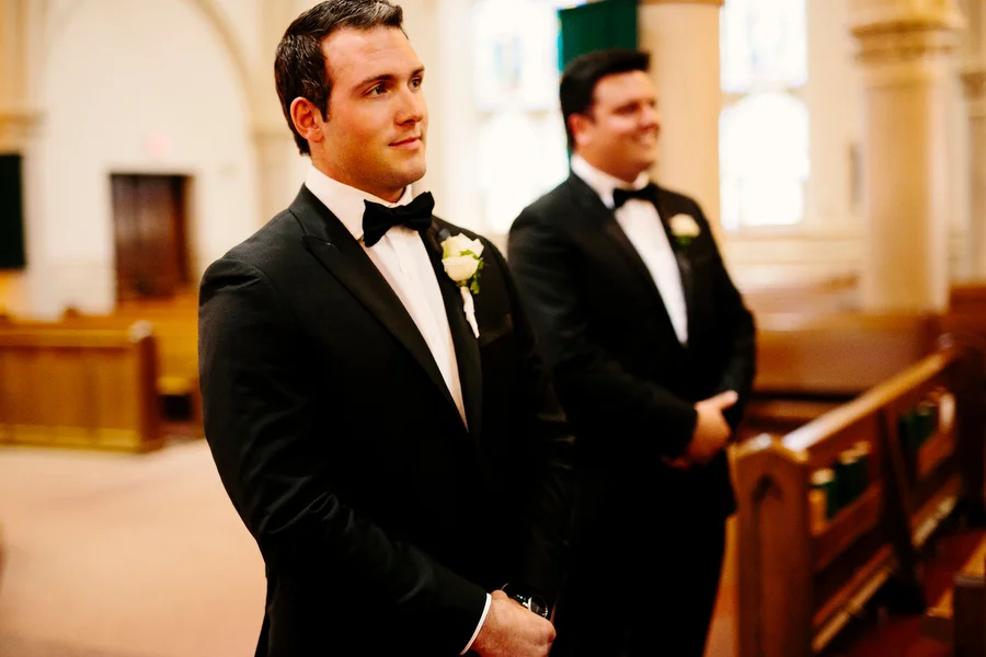 Groom at the altar