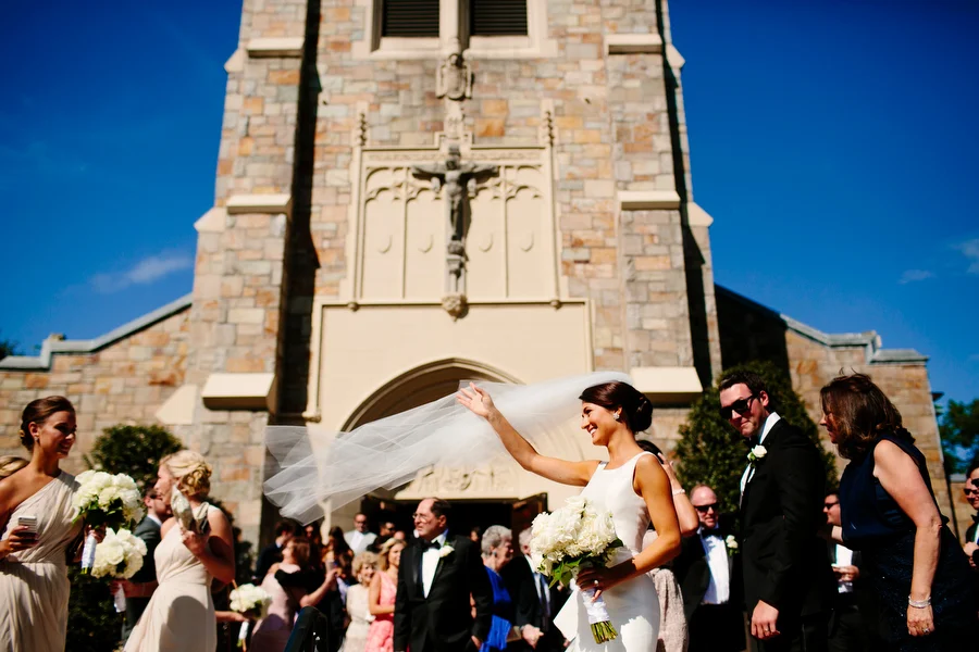 Bride and Groom celebrating outside of Church