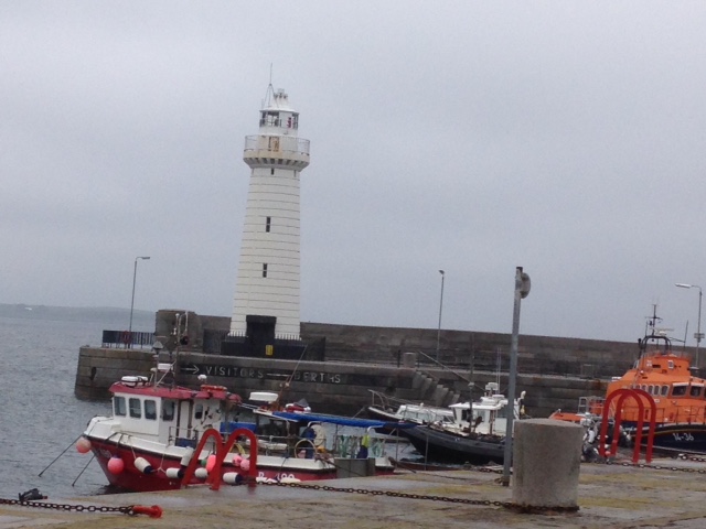 Donaghadee Famous Limestone Lighthouse - on the night of 11th January 1836, a fixed light shone at the end of the south pier for the first time. It has been regularly painted white for about a century, the first in Ireland to be electrified. 