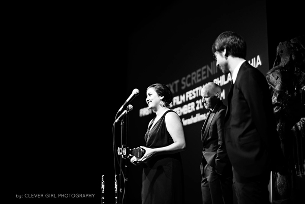  Amanda Danziger, founder and filmmaker at Ferasha Films accepts an award from the Philadelphia Geek Awards for Best Indie Feature Film of the Year for  The Backyard Philly Project. Photo by Clever Girl Photography.  