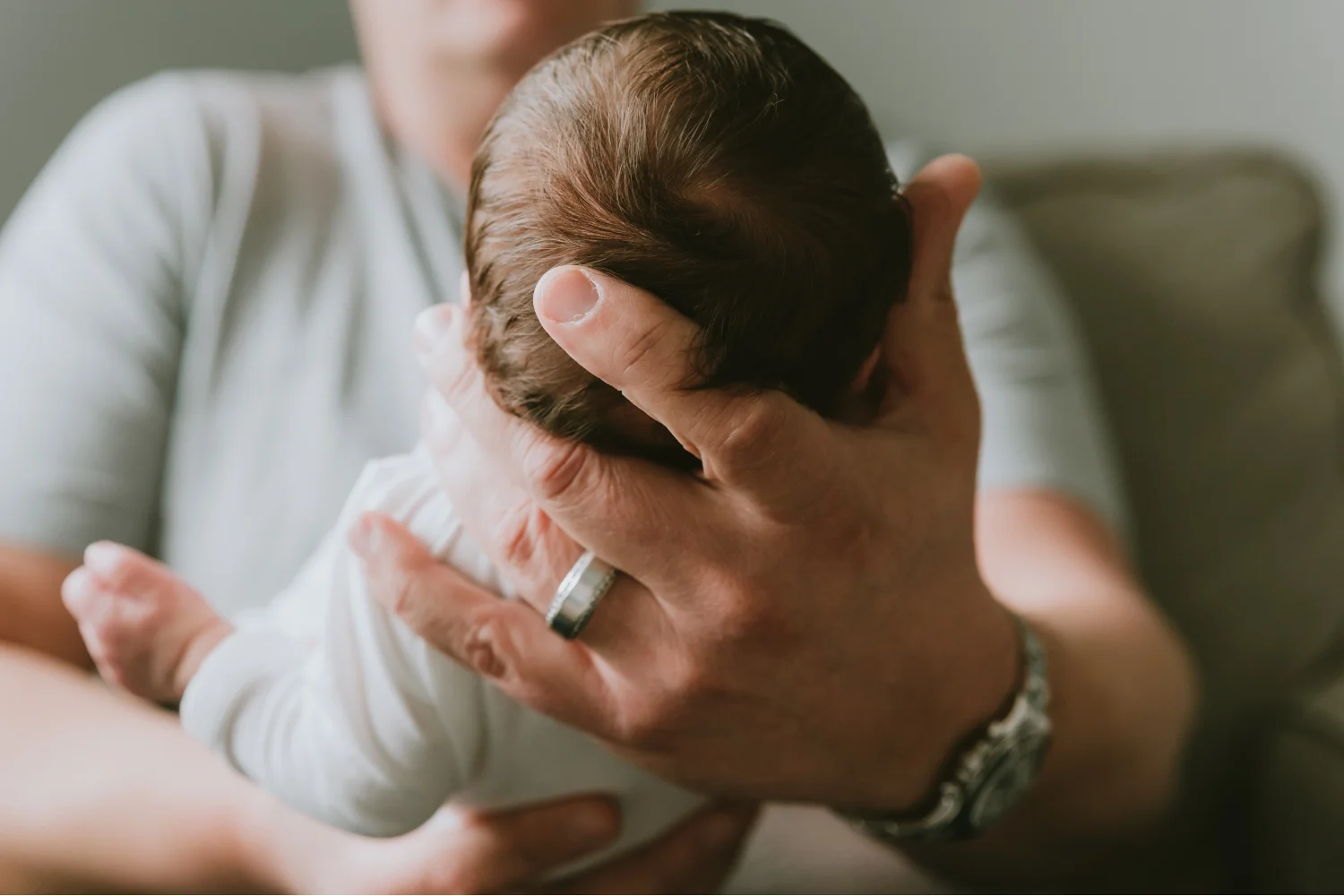 Dad-Holding-Newborn-Baby-Boy-During-In-Home-Newborn-Photography-Session-Ocean-County-New-Jersey