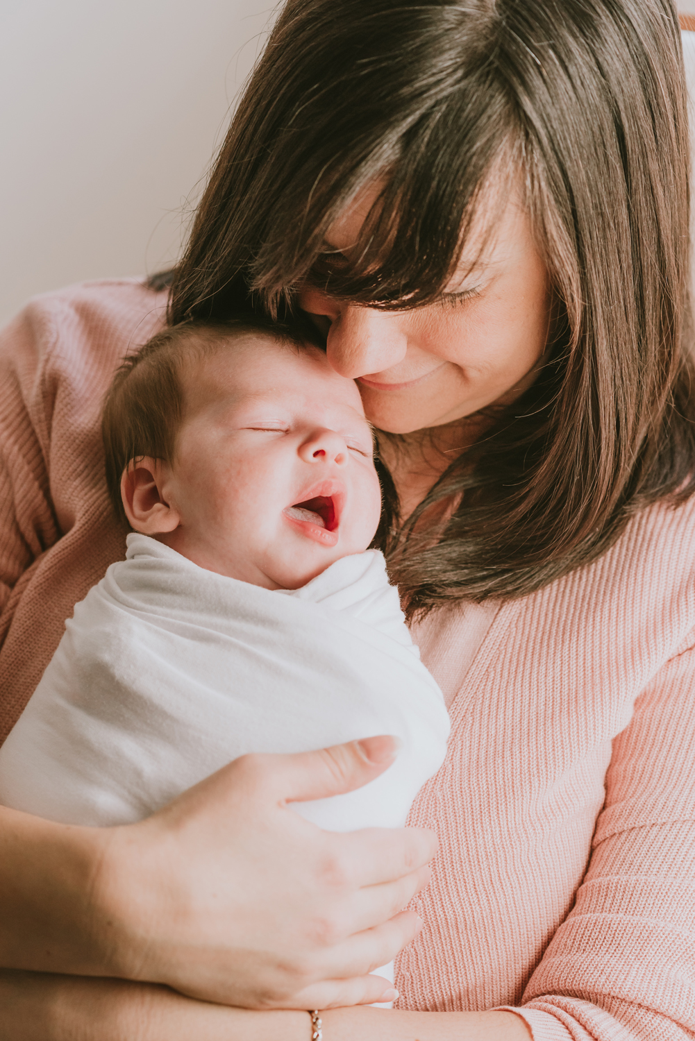 Mom-Cuddling-Newborn-Monmouth-County-New-Jersey