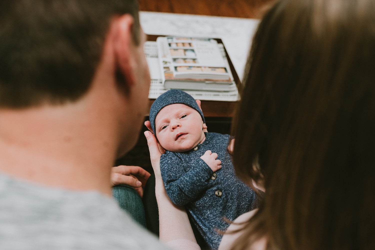 Shot-Of-Newborn-Between-Parents