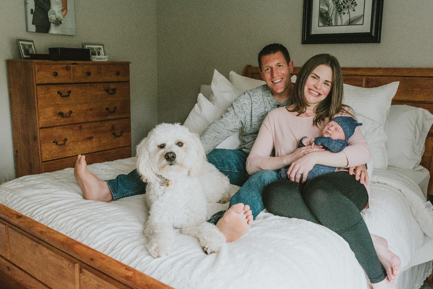 Family-With-Dog-In-Bed