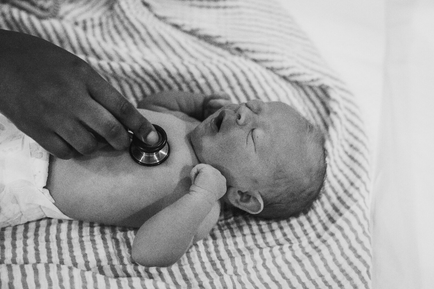 Stethescope-On-Baby-During-Newborn-Exam