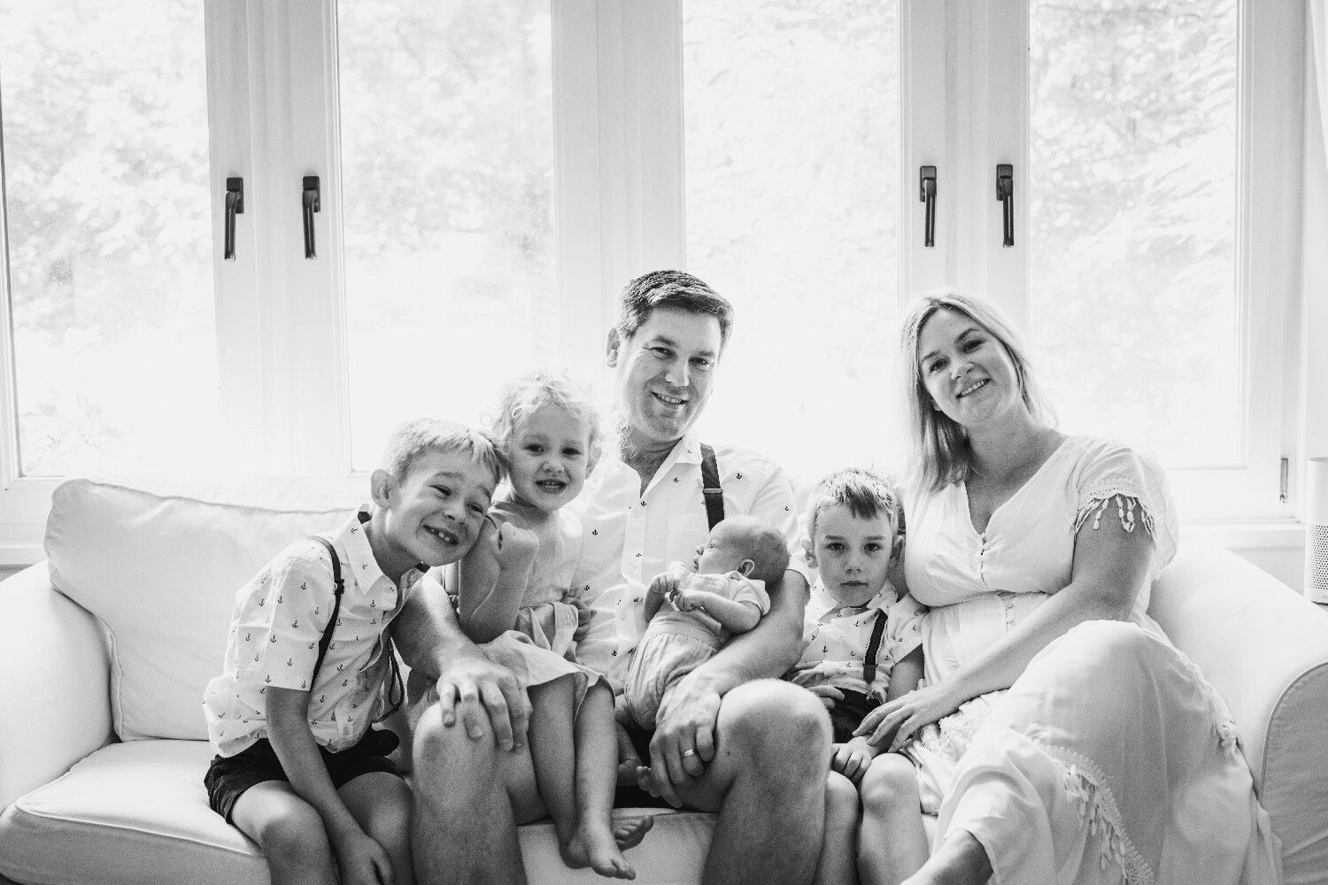 Black-And-White-Family-Portrait-On-Couch