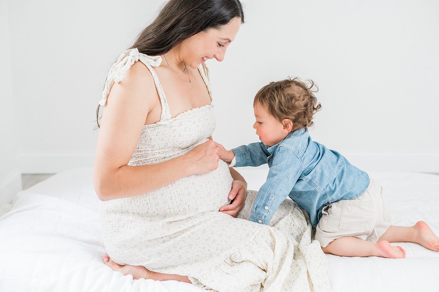 Toddler-Boy-Touching-Moms-Belly-During-Maternity-Session-By-Monmouth-County-NJ-Maternity-Photographer.jpg