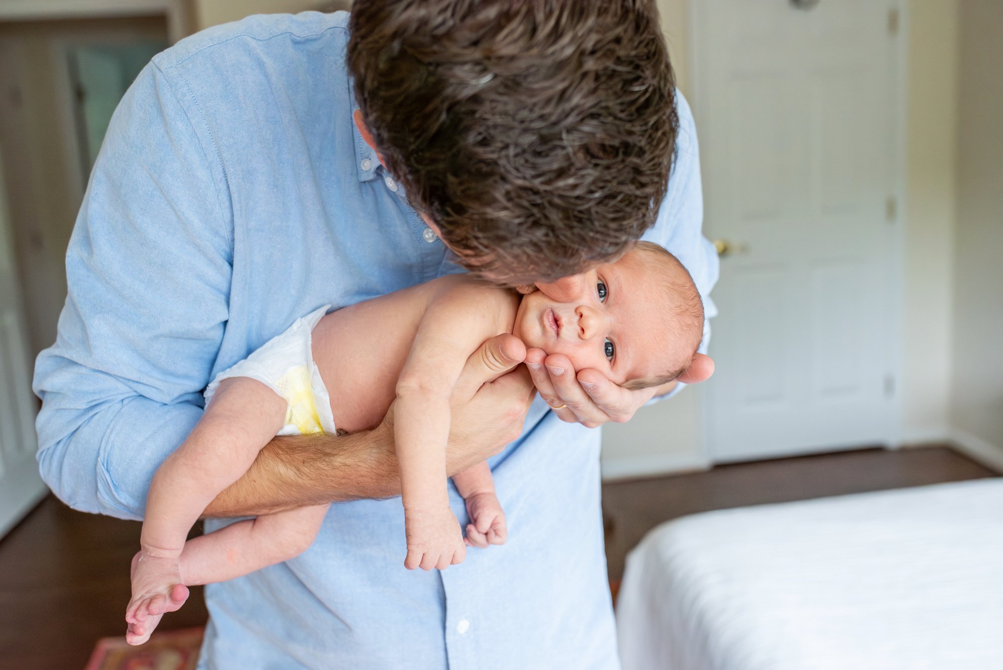 Dad-Kissing-Baby-Boy-In-Home-Newborn-Session-NJ