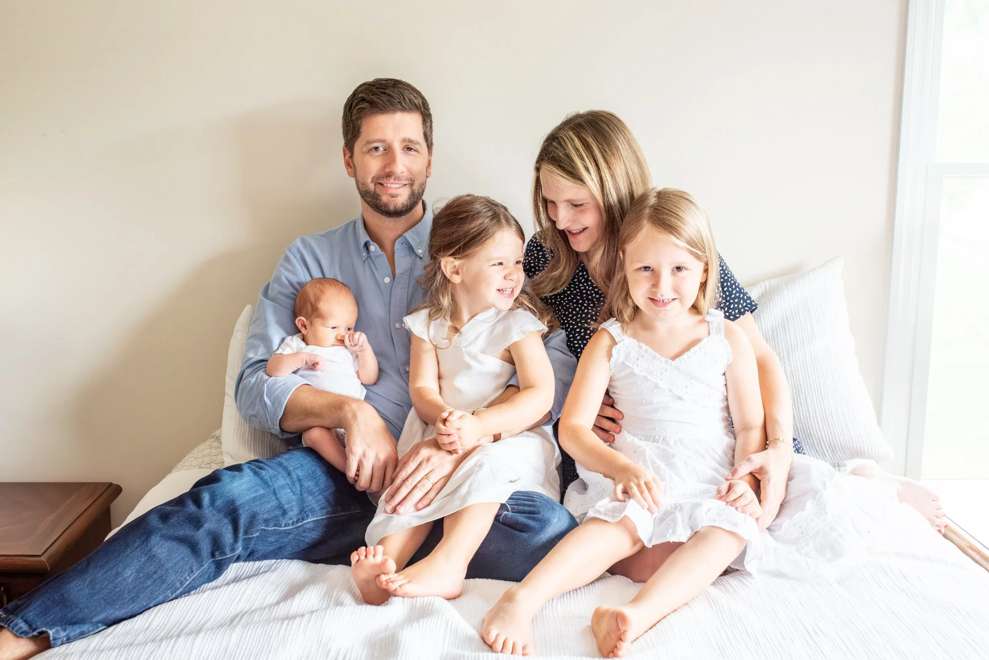Sweet-Moment-During-Family-Portrait-In-Home-Newborn-Session-NJ