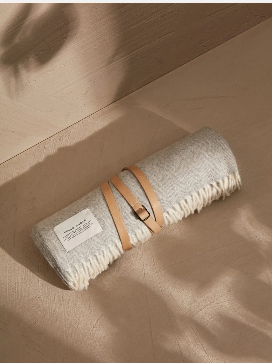 FELLS-ANDES-SORENSEN-LEATHER-STRAPP-SAND-SILL-THROW-BLANKET-BABY-ALPACA-LIFESTYLE.jpg