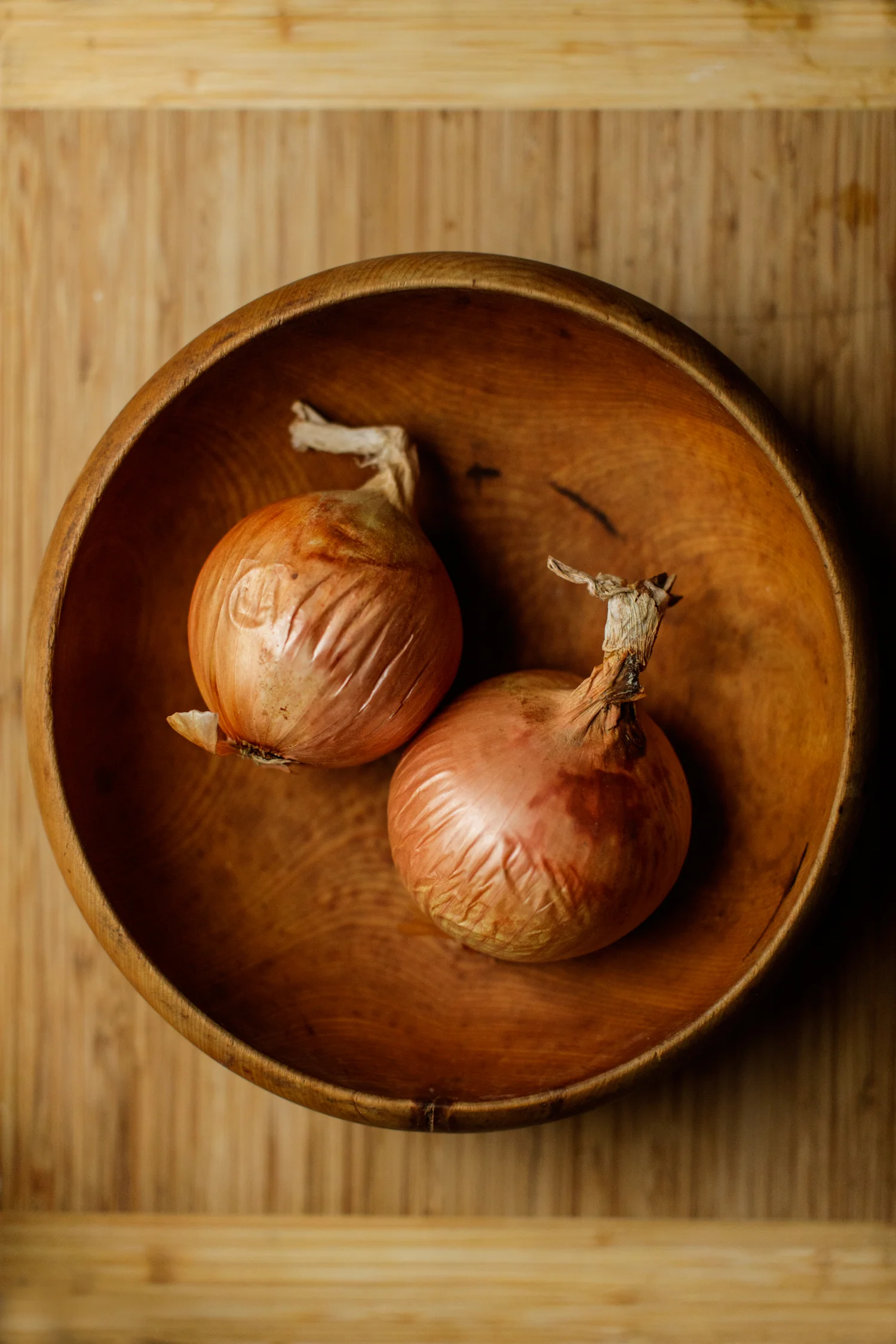 Two onions in a bowl