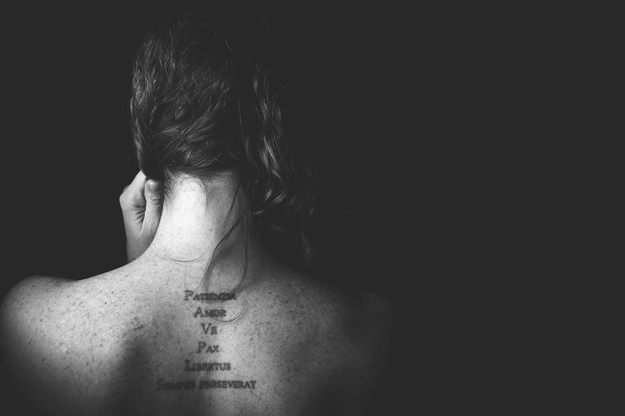 upper back tattoo on woman