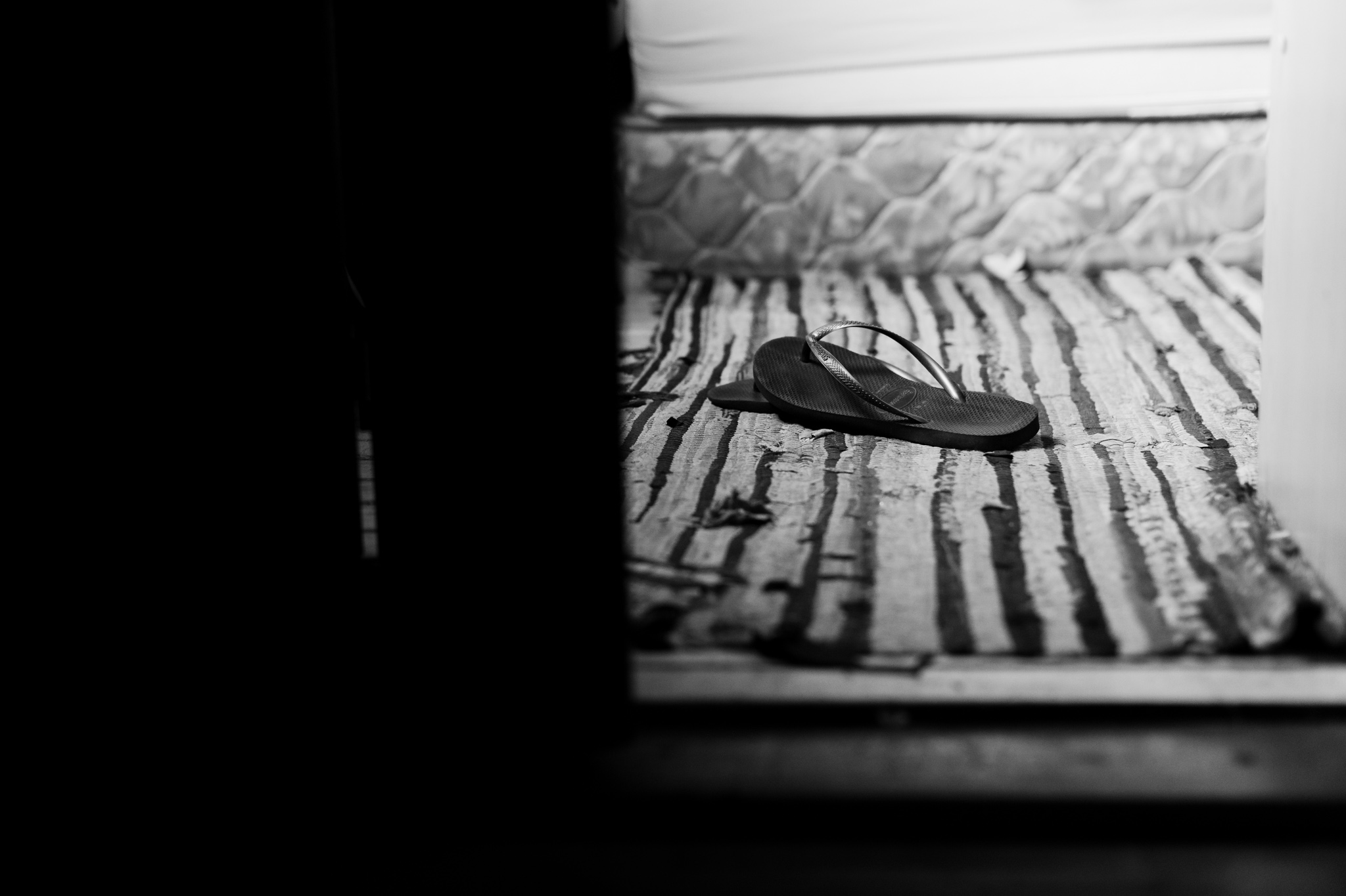 flip flops on a bedroom floor