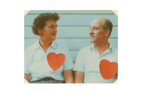 Julia and Paul with their big red hearts.