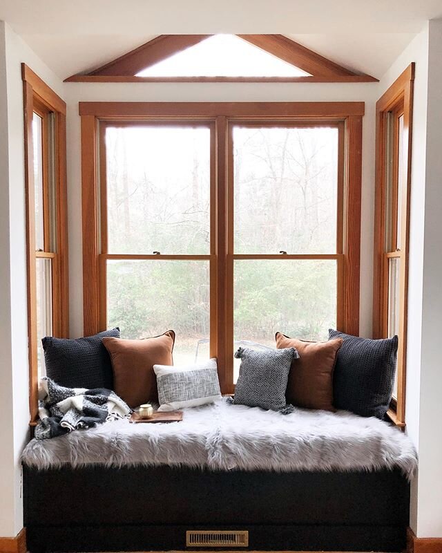 I have been dreaming of a window seat for this space and it&rsquo;s done! We had a great carpenter build a storage bench (swipe to see) and then I painted it black and added a cushion and pillows for my new favorite spot in our house. I&rsquo;m think