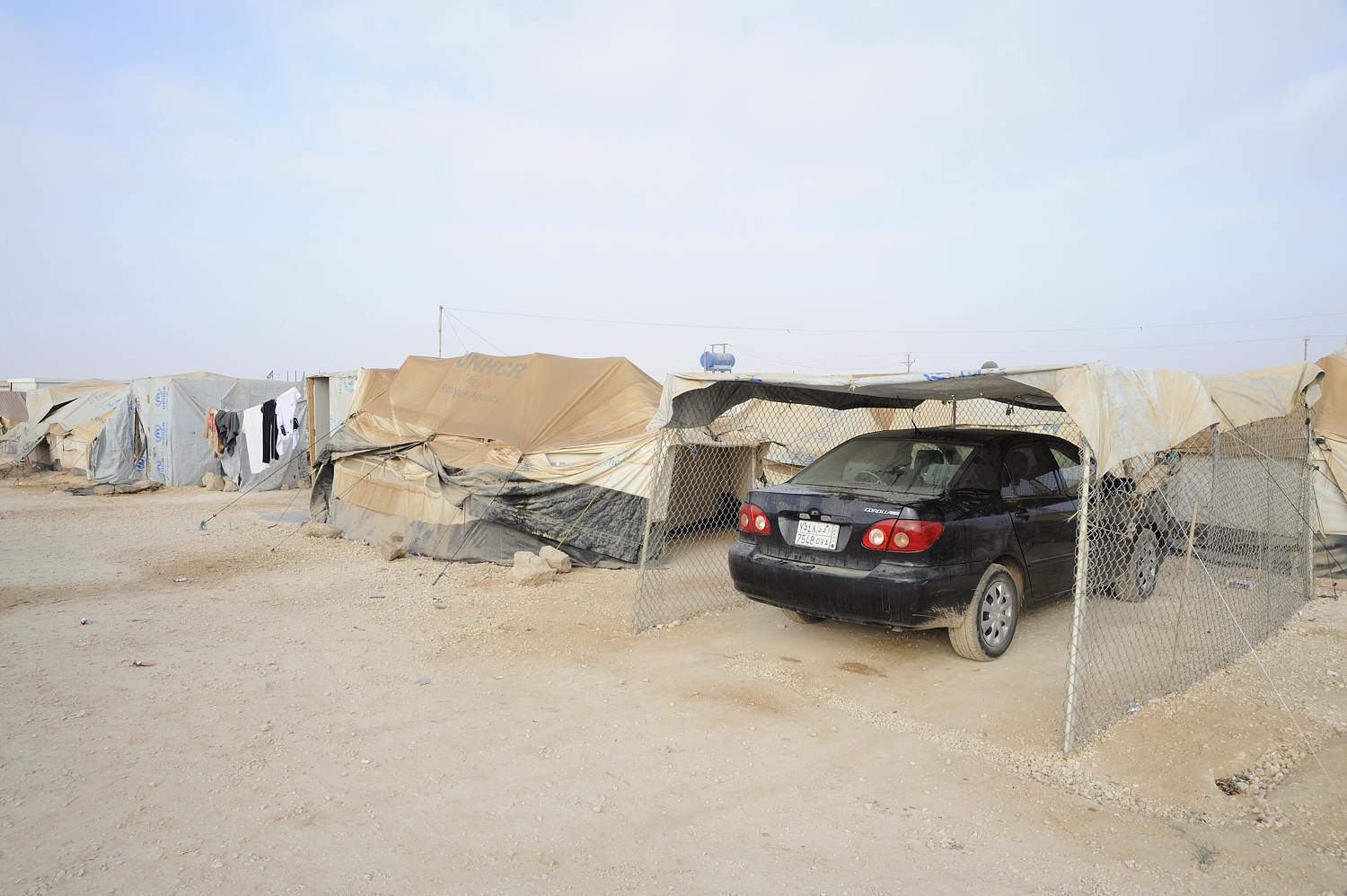  The first private garage in Zaatari popped up this week. The fencing was stolen from somewhere else in the camp.  